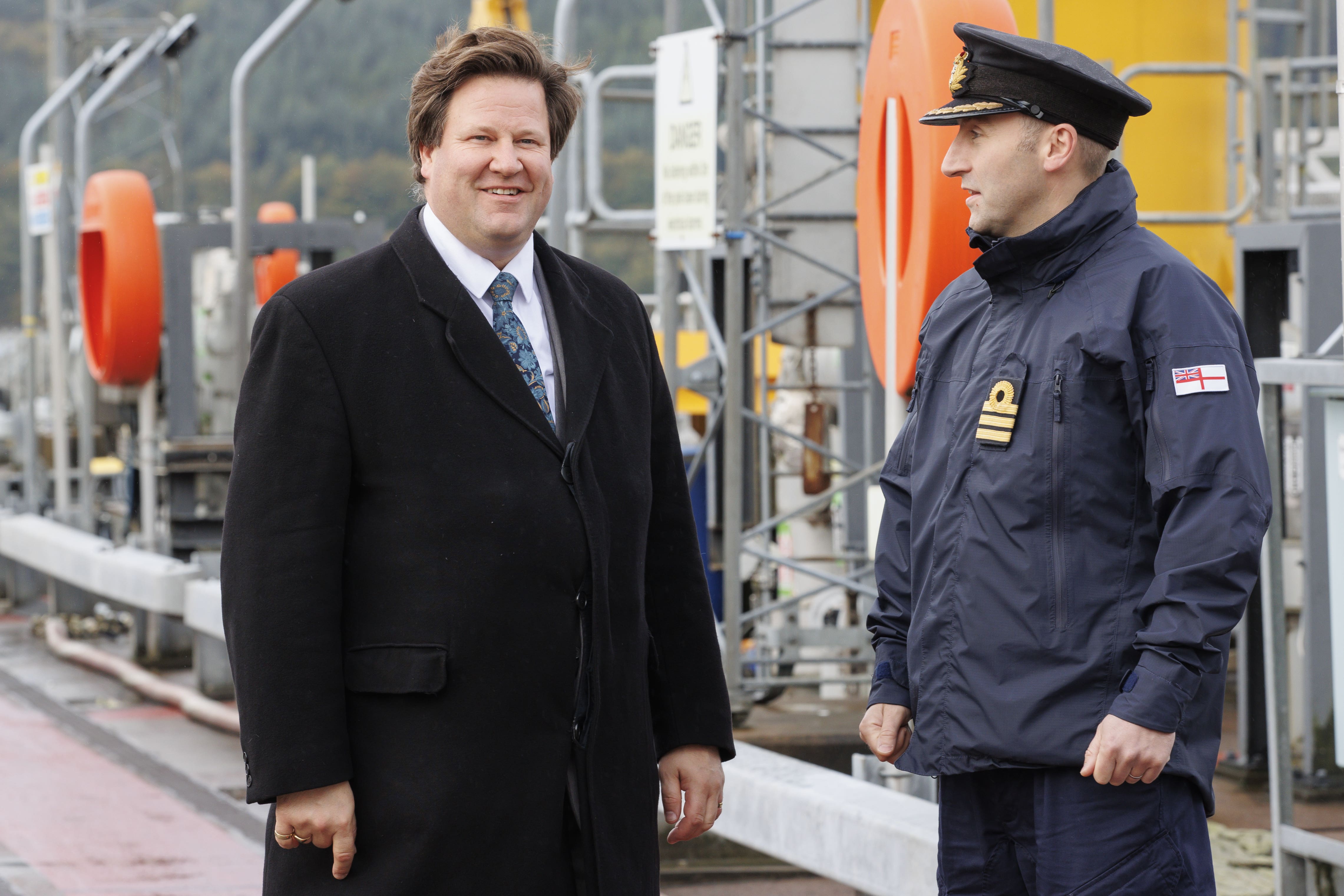 Defence Procurement minister Alec Shelbrooke meets Commander Morrow from attack submarine HMS Ambush during a visit to Faslane naval base in Scotland (Steve Welsh/PA)