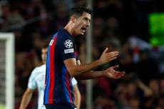 Robert Lewandowski scores late equaliser to give Barcelona Champions League hope