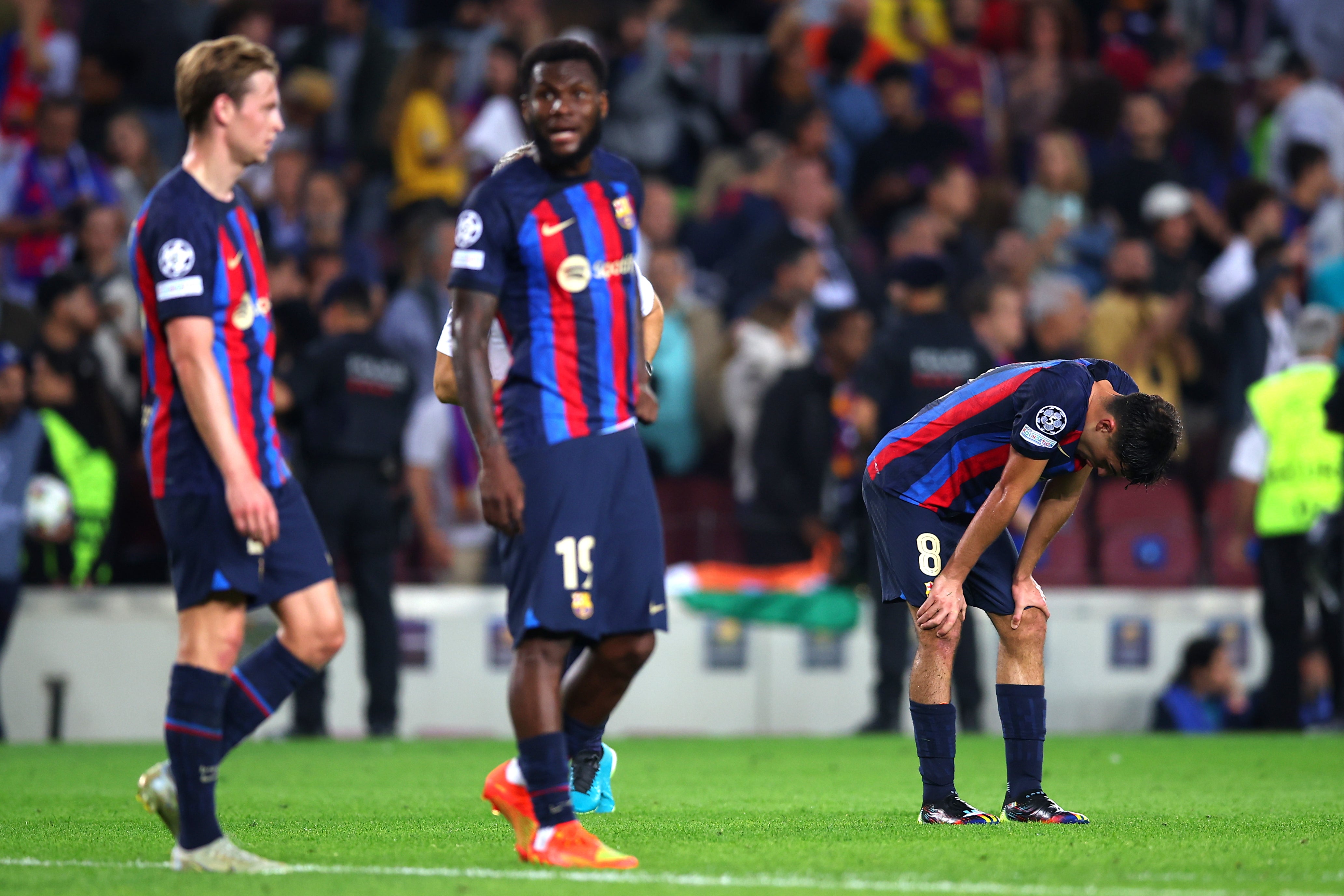 Barcelona players react after the 3-3 draw with Inter