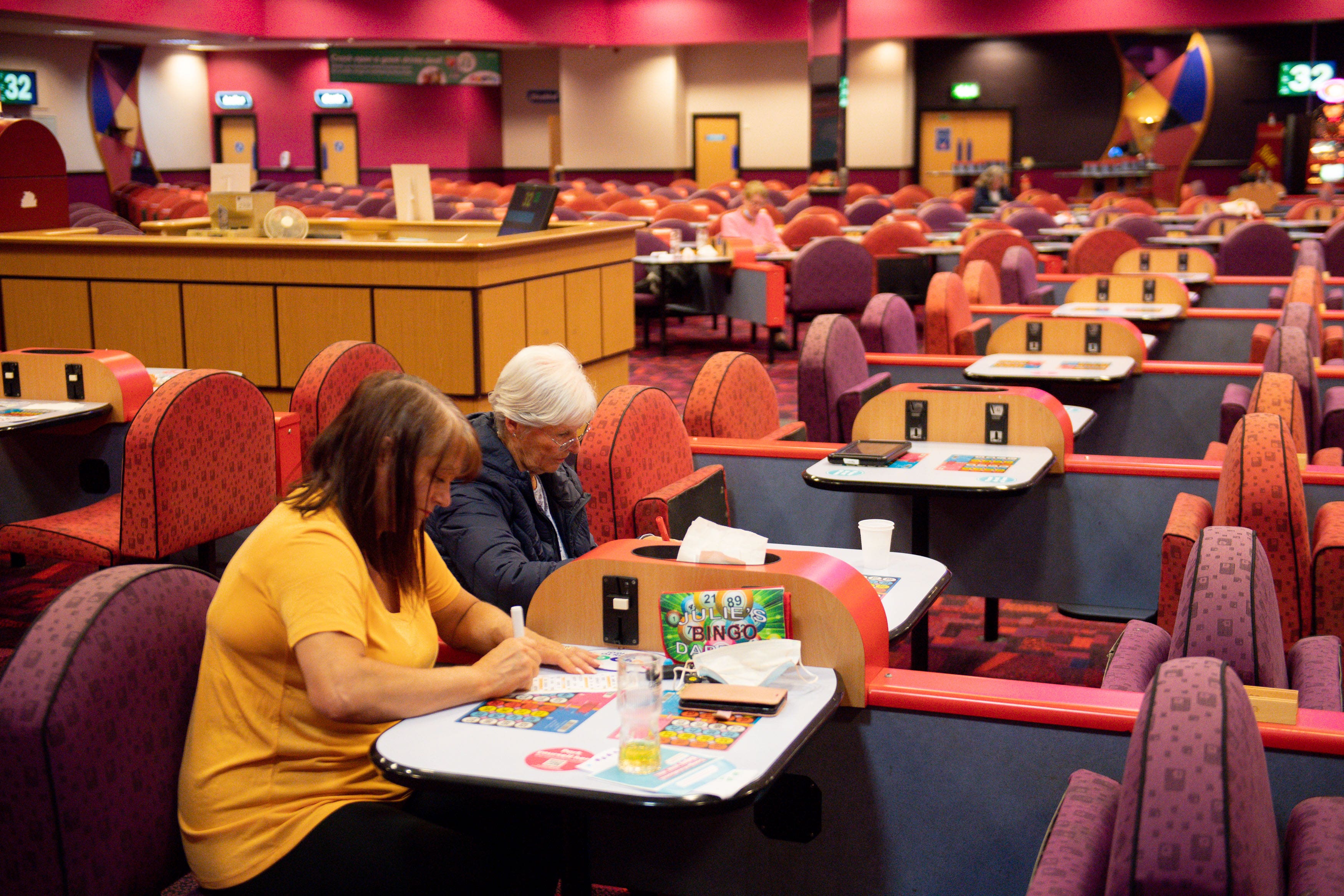 Customers enjoy a game at the Mecca Bingo hall in Birmingham (Jacob king/PA)