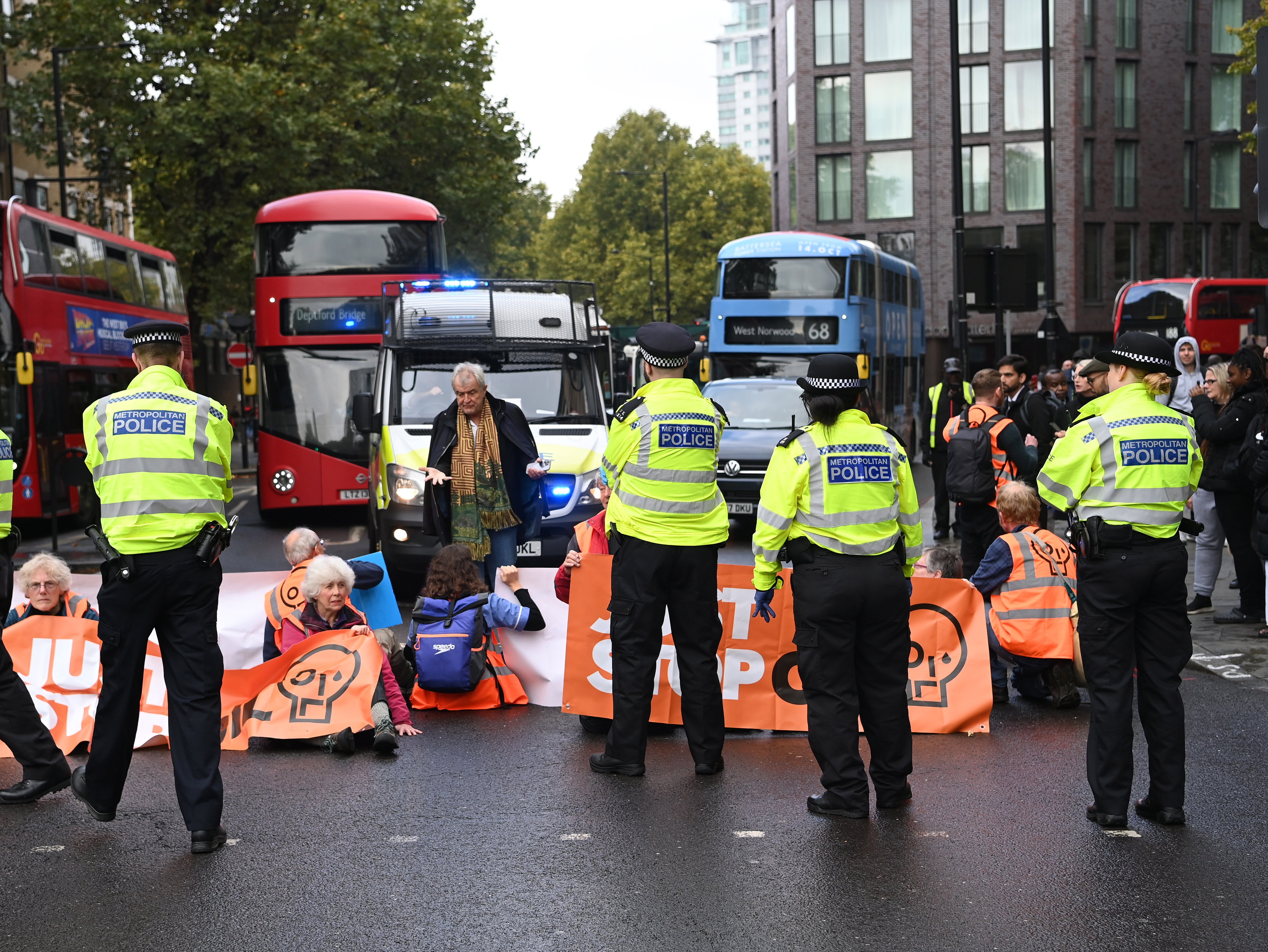 Just Stop Oil demonstrators blocking roads clash with drivers on 13th day of protests