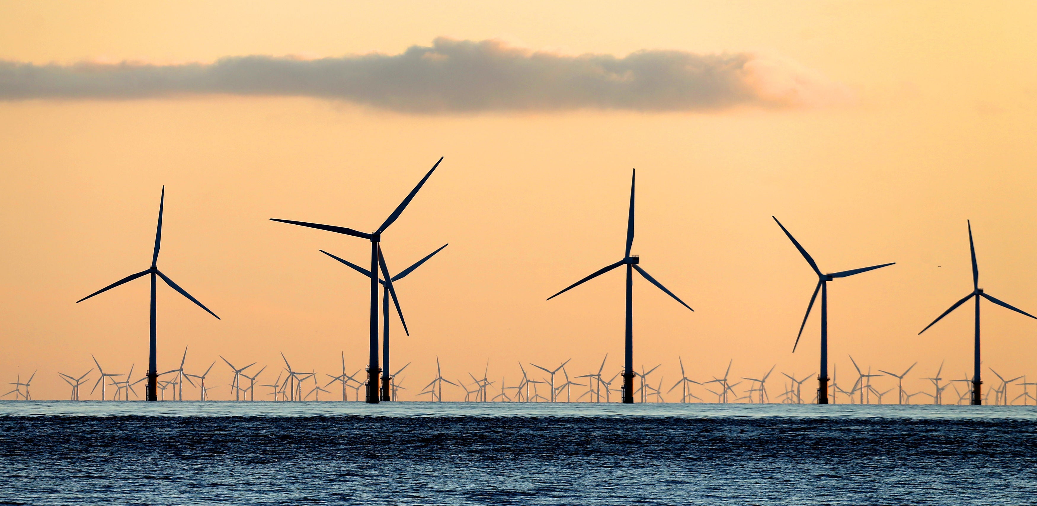 Wind turbines seen from the beach at Crosby, Merseyside, England