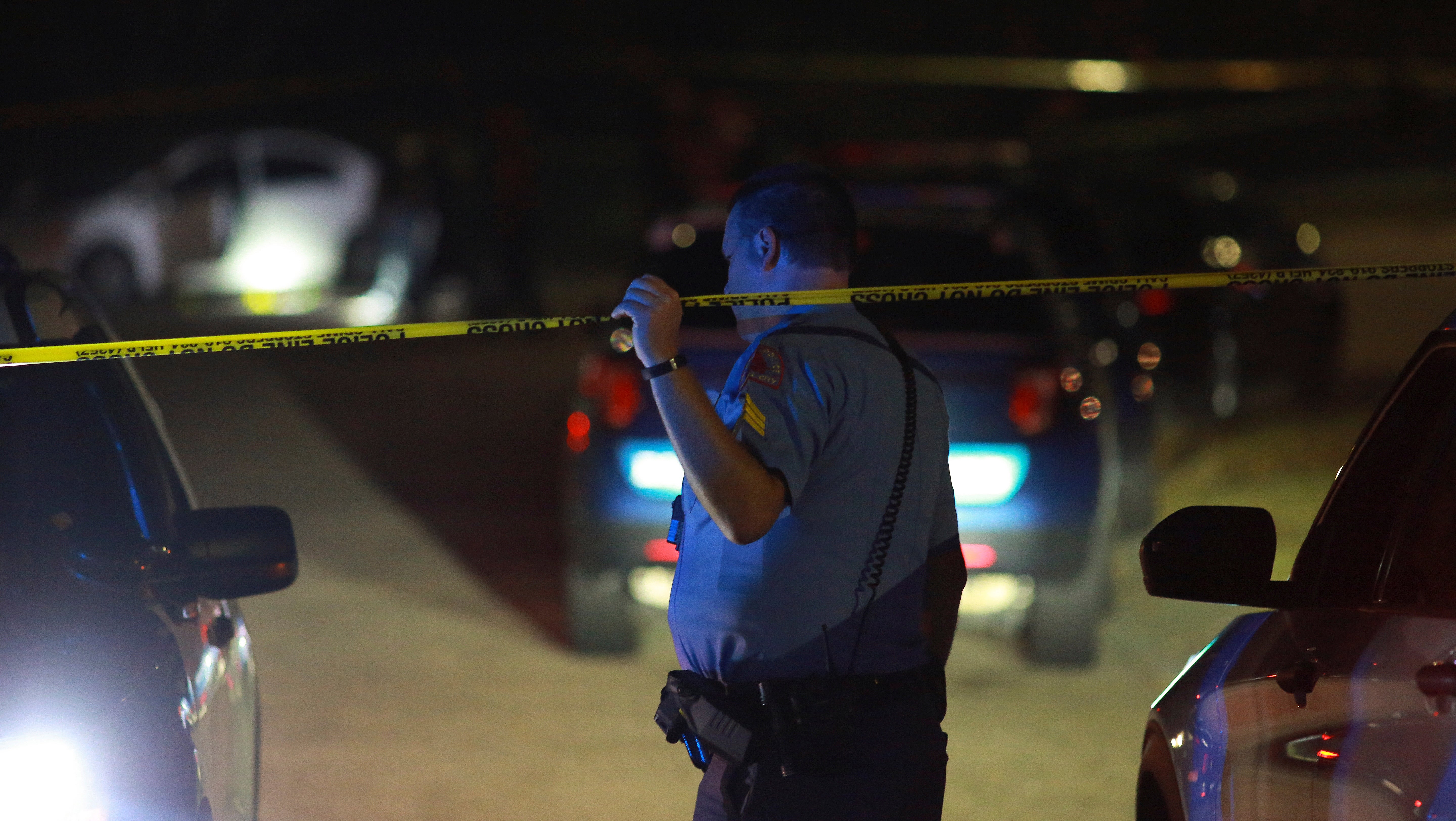 Police officers work in the Hedingham residential neighborhood