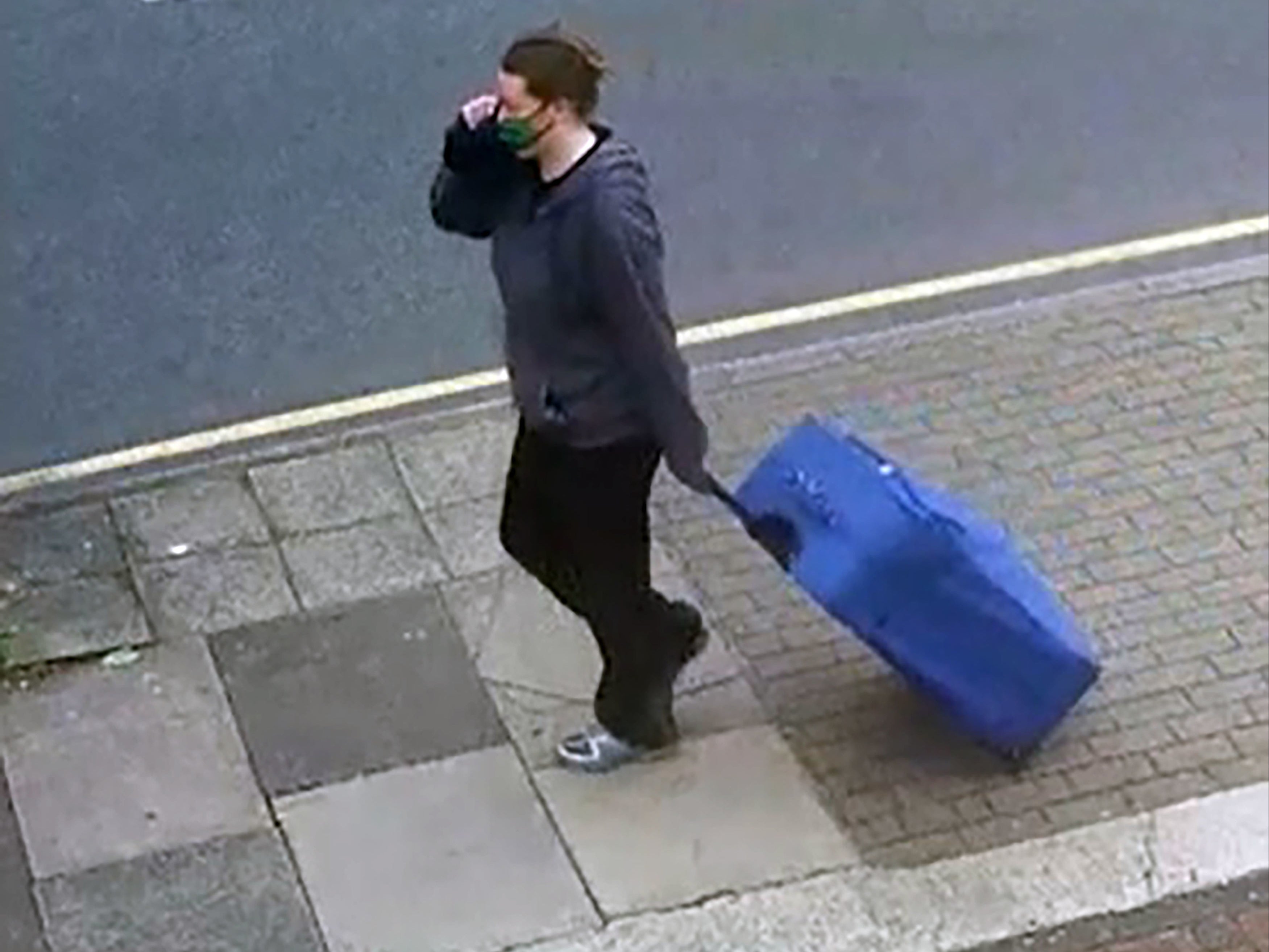 CCV showed Jemma Mitchell carrying a blue suitcase along Chaplin Road on 11 June