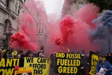 Demonstrators block Downing Street gates in protest at PM’s climate approach