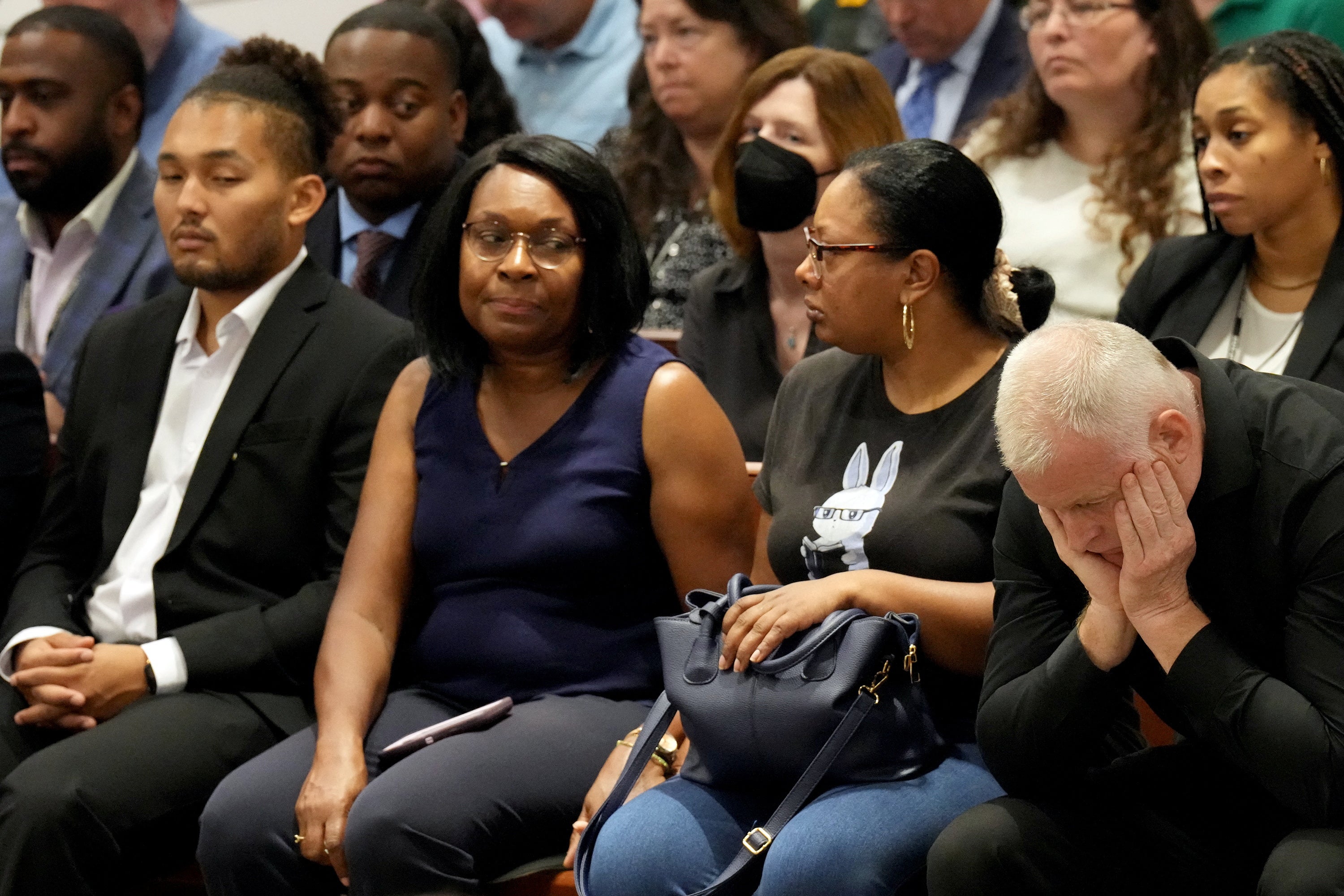 Anne Marie Ramsay and Vincent Ramsay react as they hear that Cruz will not receive the death penalty as the verdicts were announced Thursday