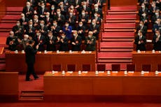 China will not renounce use of force over Taiwan, Xi says as Communist Party congress begins