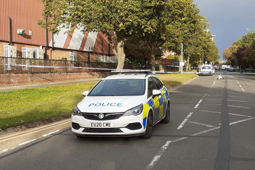 Officers will remain on the Oakwood Hill Industrial Estate (pictured) as the investigation continues