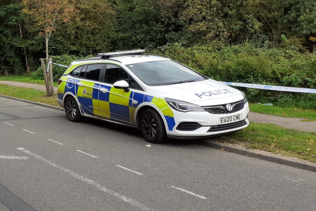 Officers were called to the discovery of a body in woodland by industrial park on Saturday