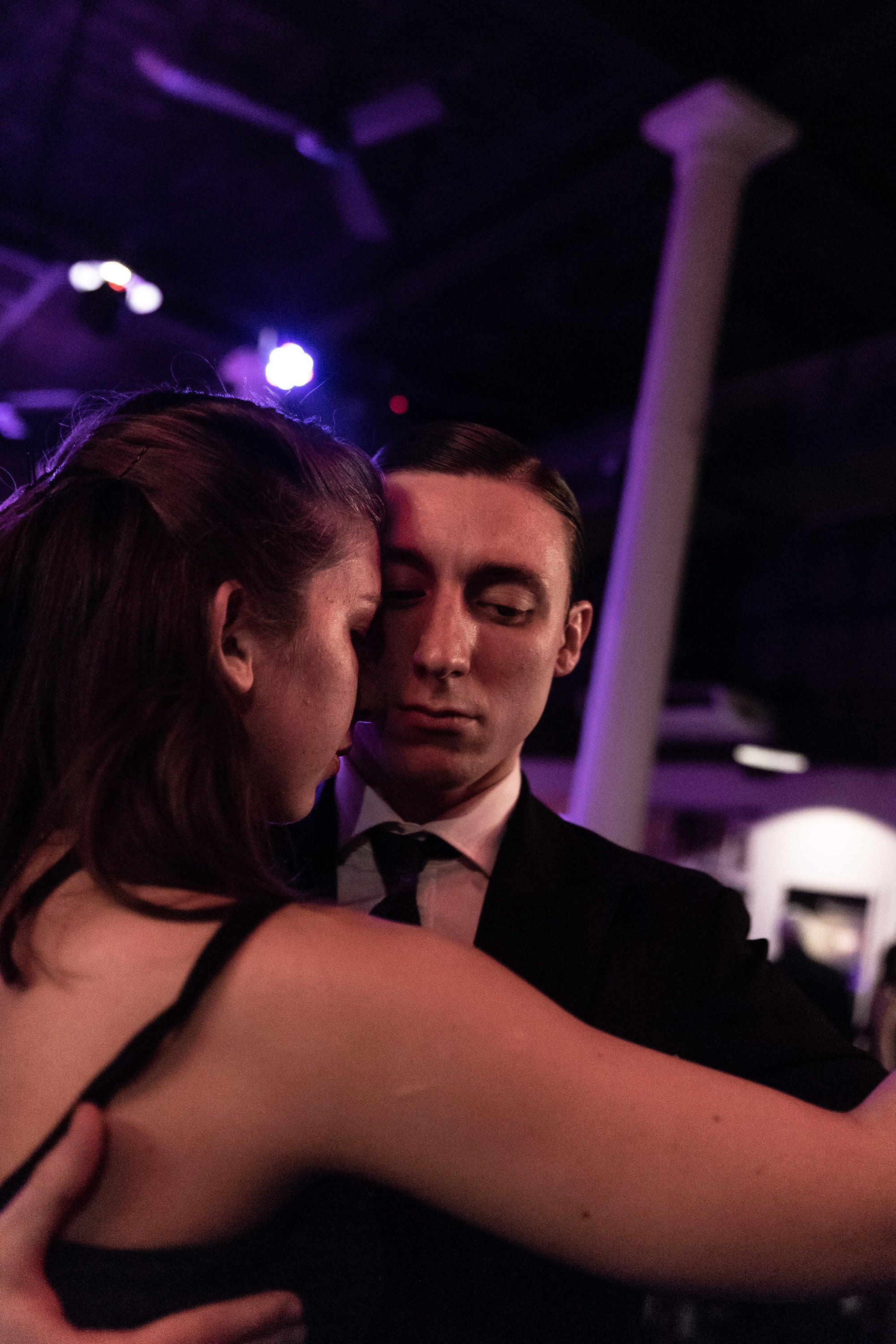 Camilo Benedix and his partner dance at a milonga