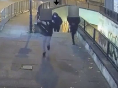 CCTV shows the trio running away from the scene of the attack