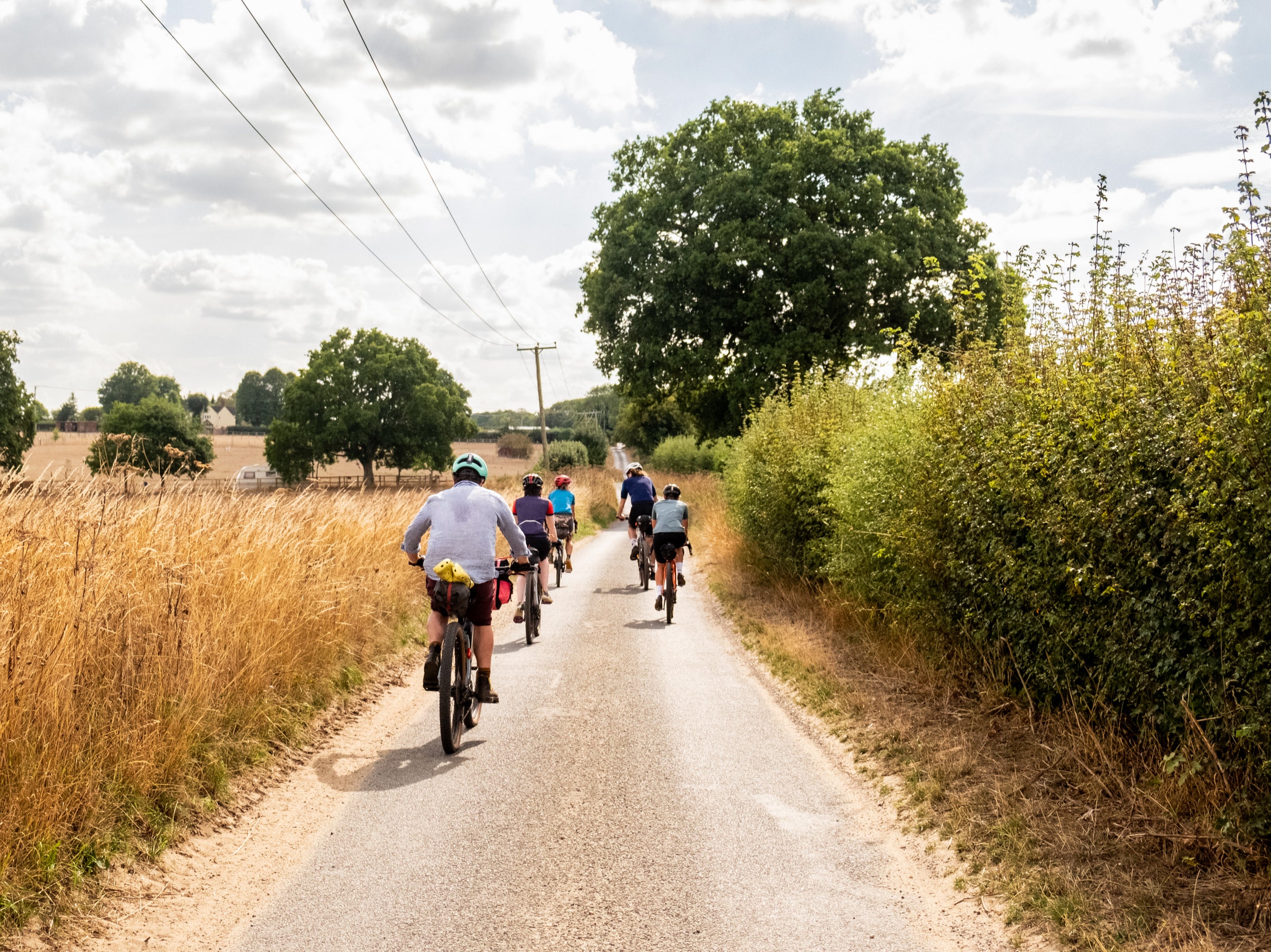 Cyclists ride down one of the quiet ways making up Norfolk’s Rebellion Way