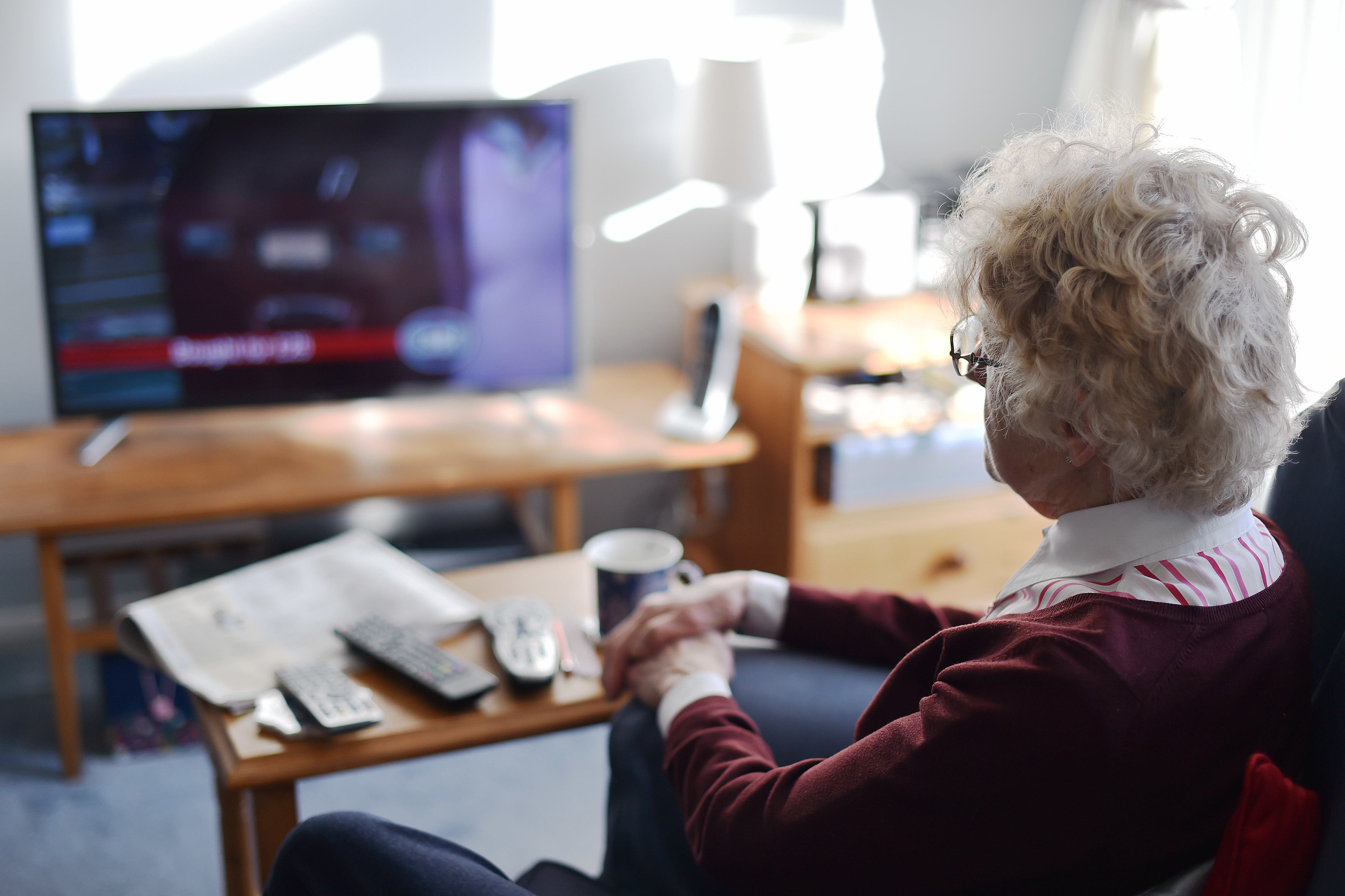 Anyone who watches or records programmes on a TV, computer or other device must buy a TV licence (Nick Ansell/PA)