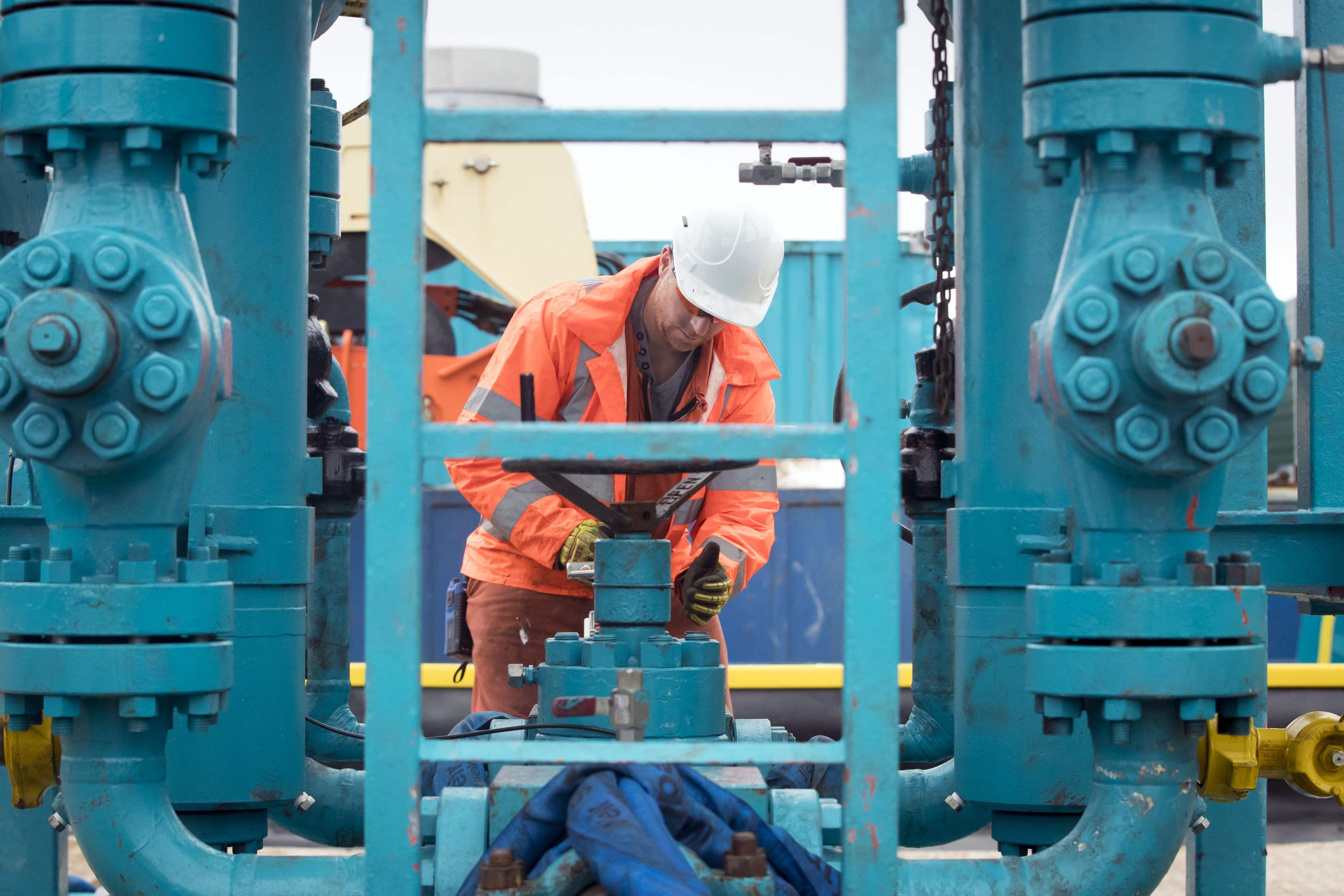 A worker at the Cuadrilla fracking site in Lancashire (Danny Lawson/PA)