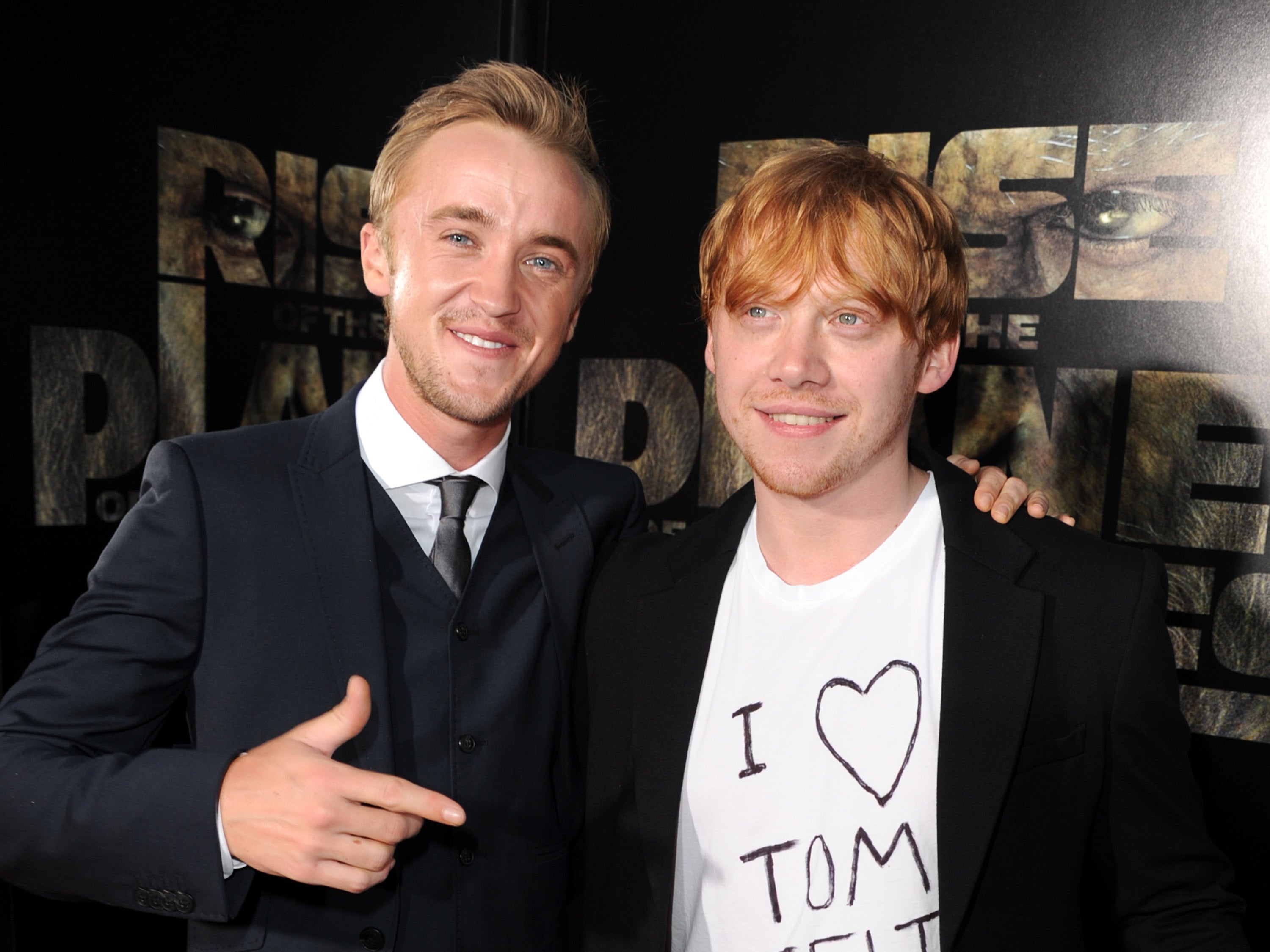 Actors Tom Felton and Rupert Grint in 2011