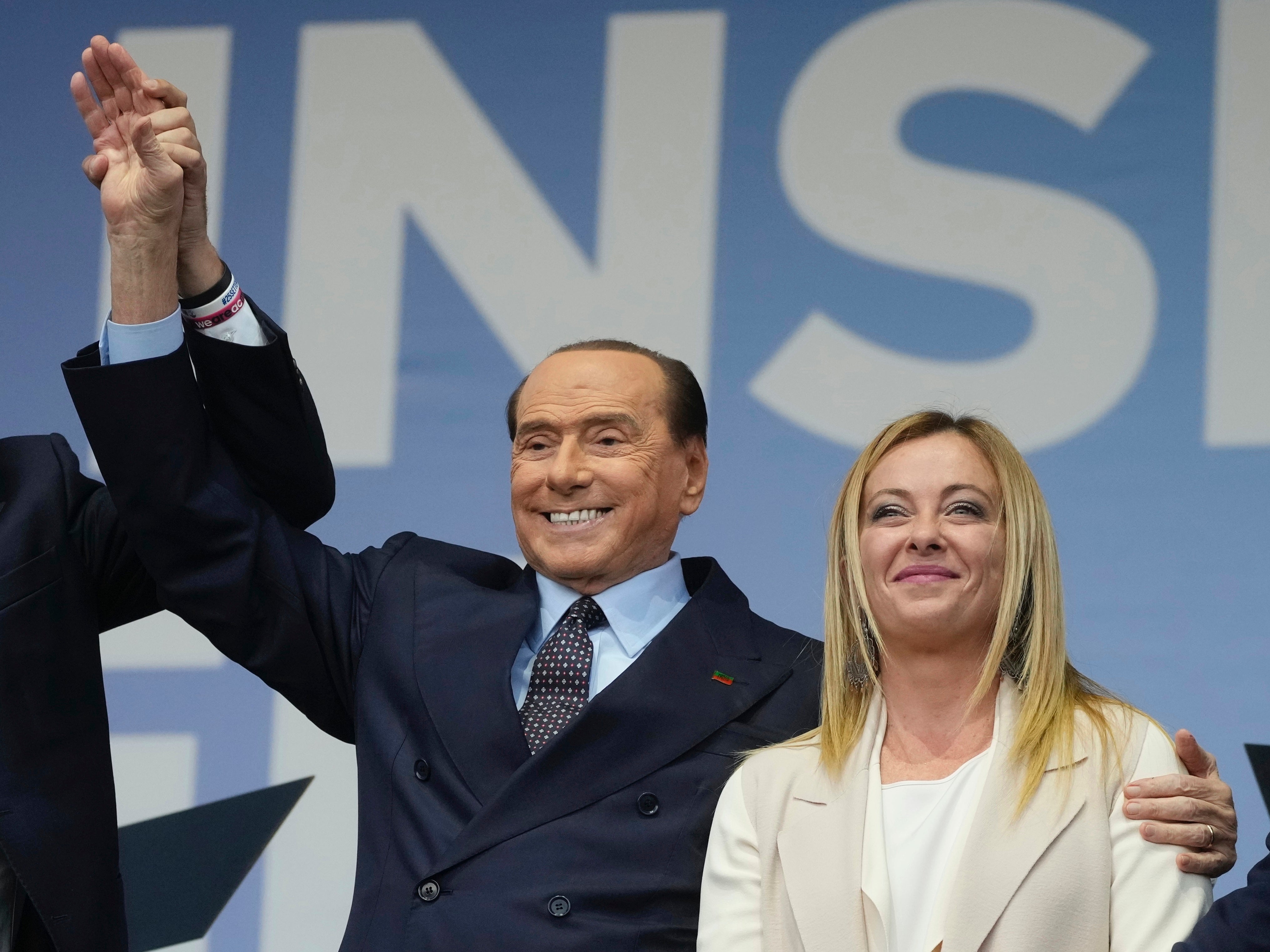 Forza Italia's Silvio Berlusconi, and Brothers of Italy's Giorgia