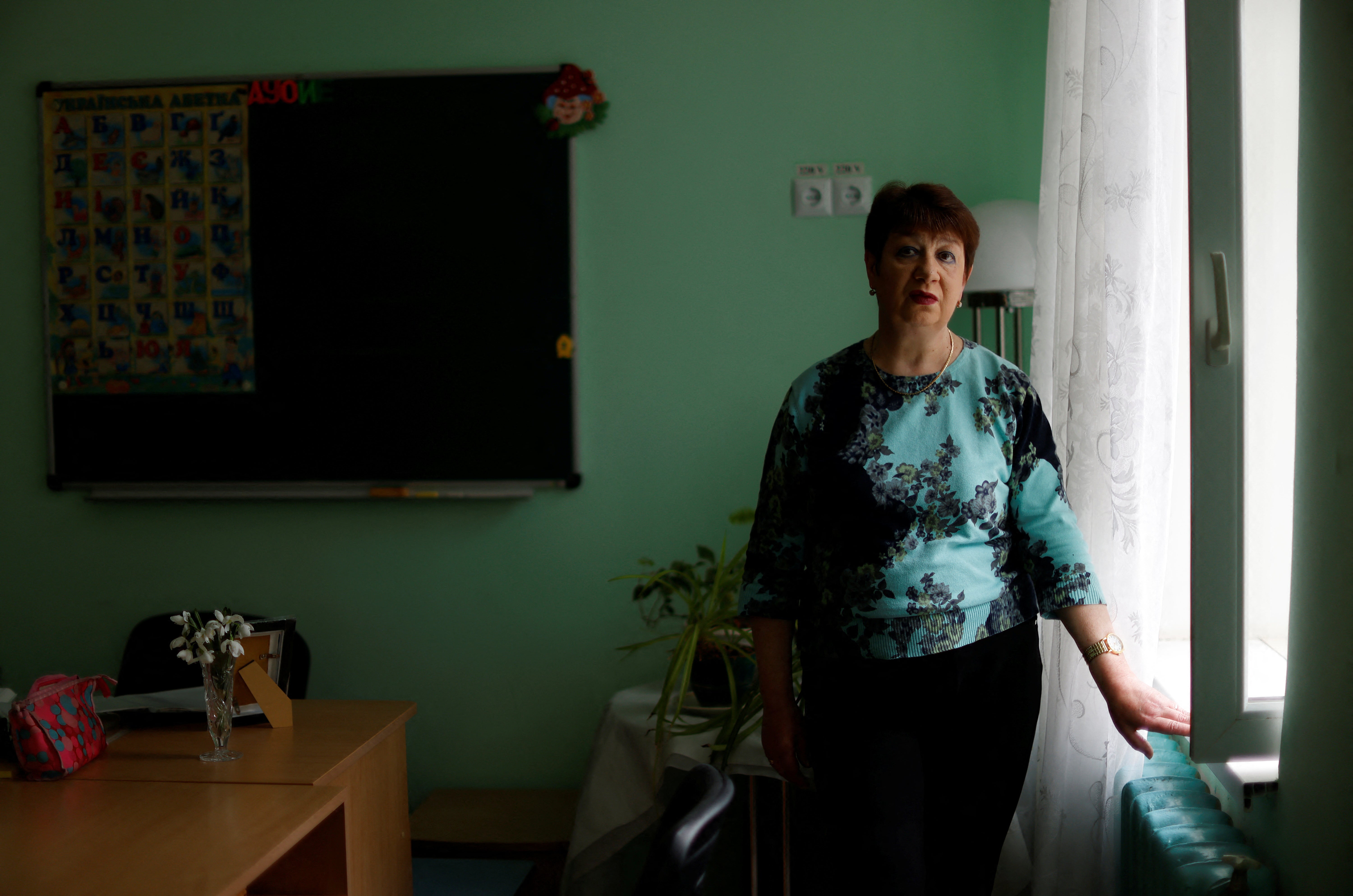 Teacher Irina Nikolaeva Ogurtsova poses for a photo