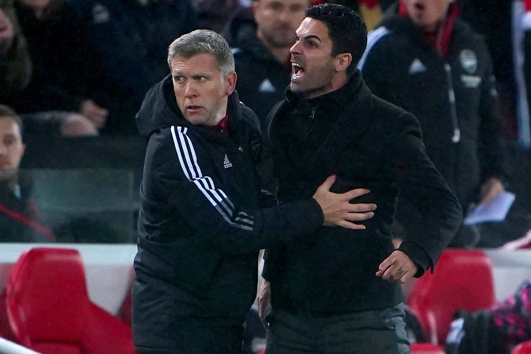 Arsenal manager Mikel Arteta (right) exchanged words with Liverpool boss Jurgen Klopp on the touchline at Anfield (Peter Byrne/PA)