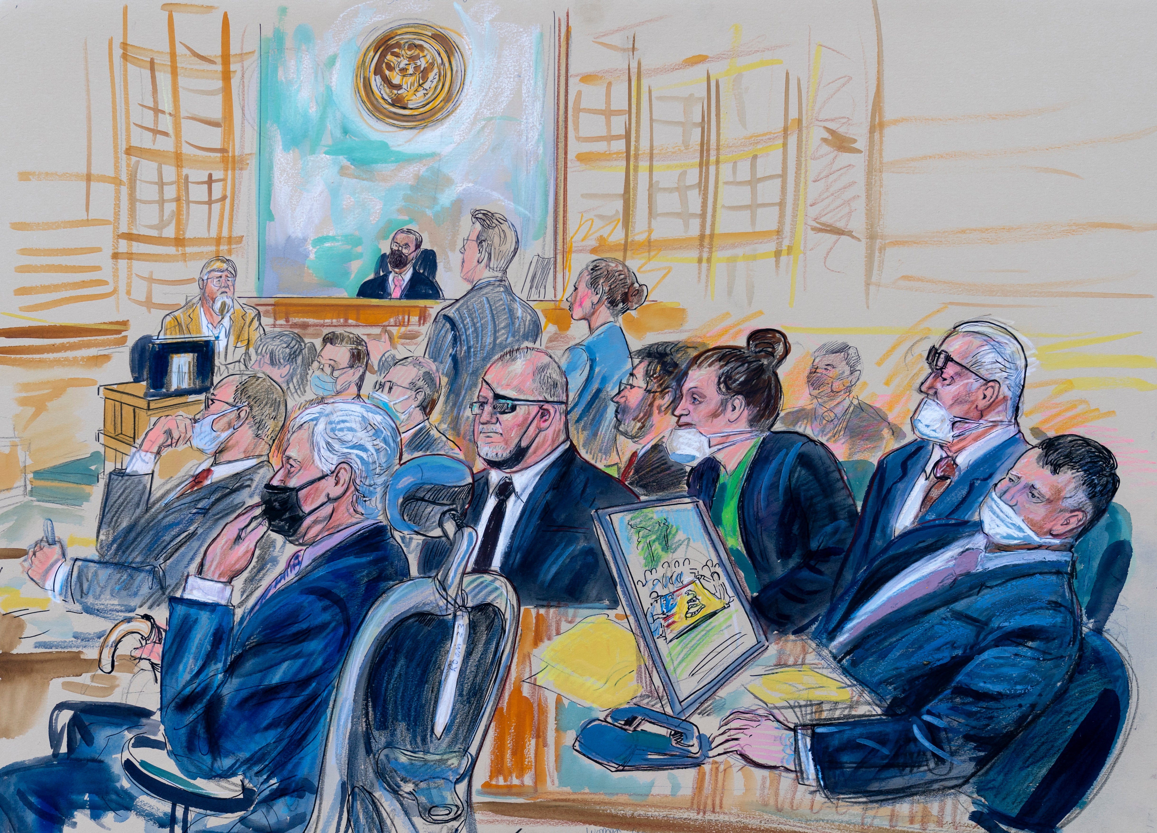 A courtroom sketch depicts Oath Keepers leader Stewart Rhodes and four others charged with seditious conspiracy.