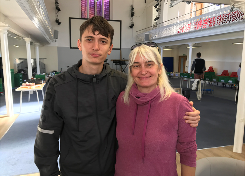 Vlad and his mother Tetiana came to Kingston foodbank to get dried food, as well as a hot coffee and pastry