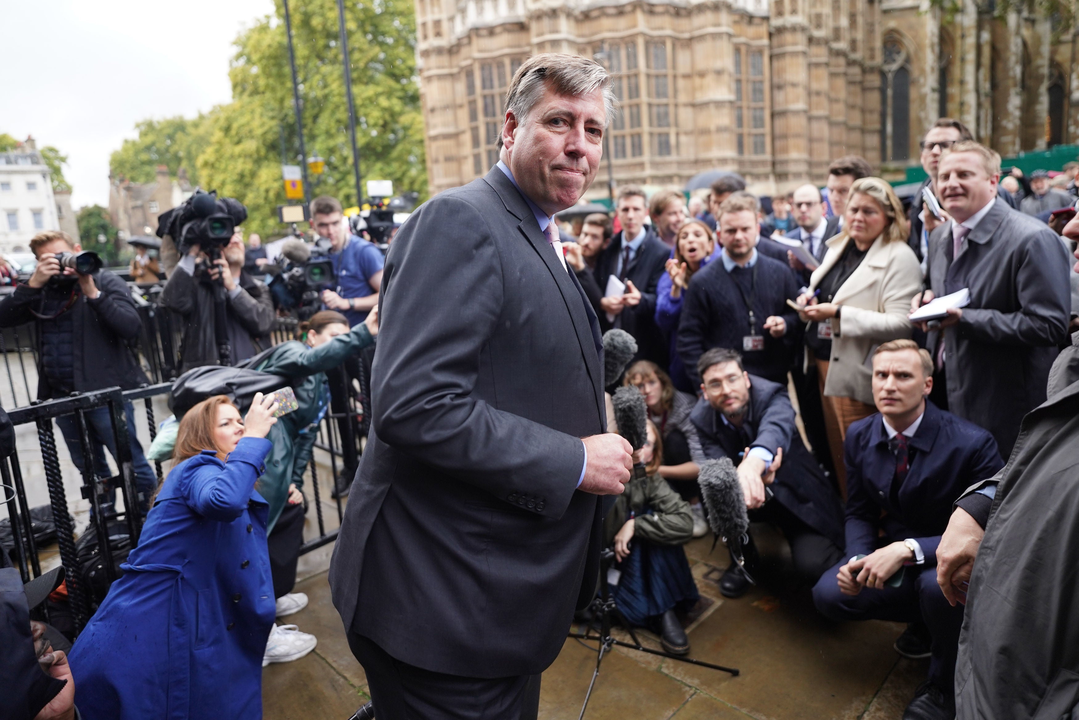 Chair of the 1922 Committee of backbench Conservatives Sir Graham Brady makes a statement outside the Houses of Parliament