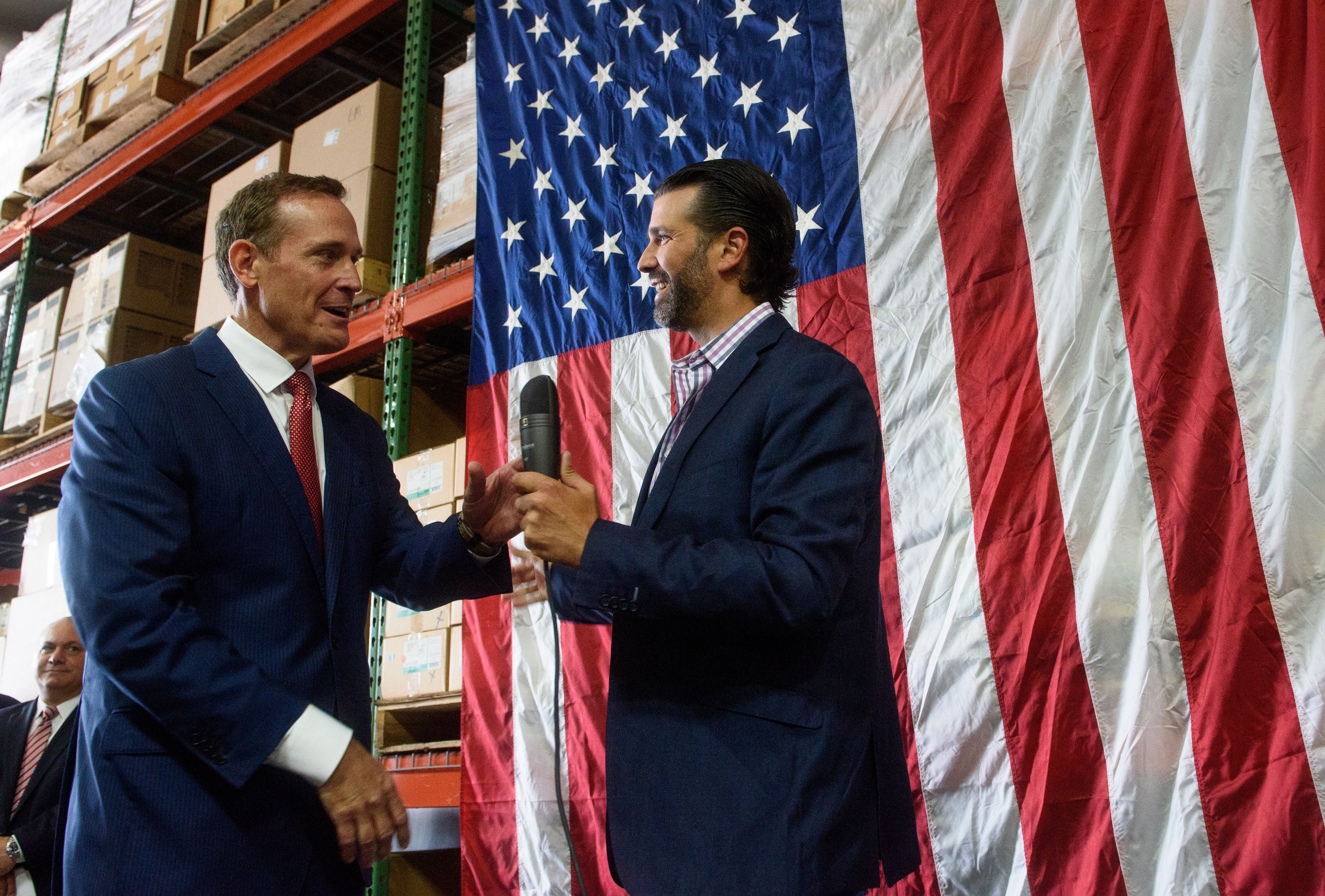 Republican candidate Ted Budd greets Donald Trump Jr as he campaigns for Senate In North Carolina