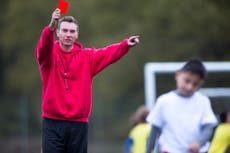 Who’d be a football ref when even kids are up for a ruck?