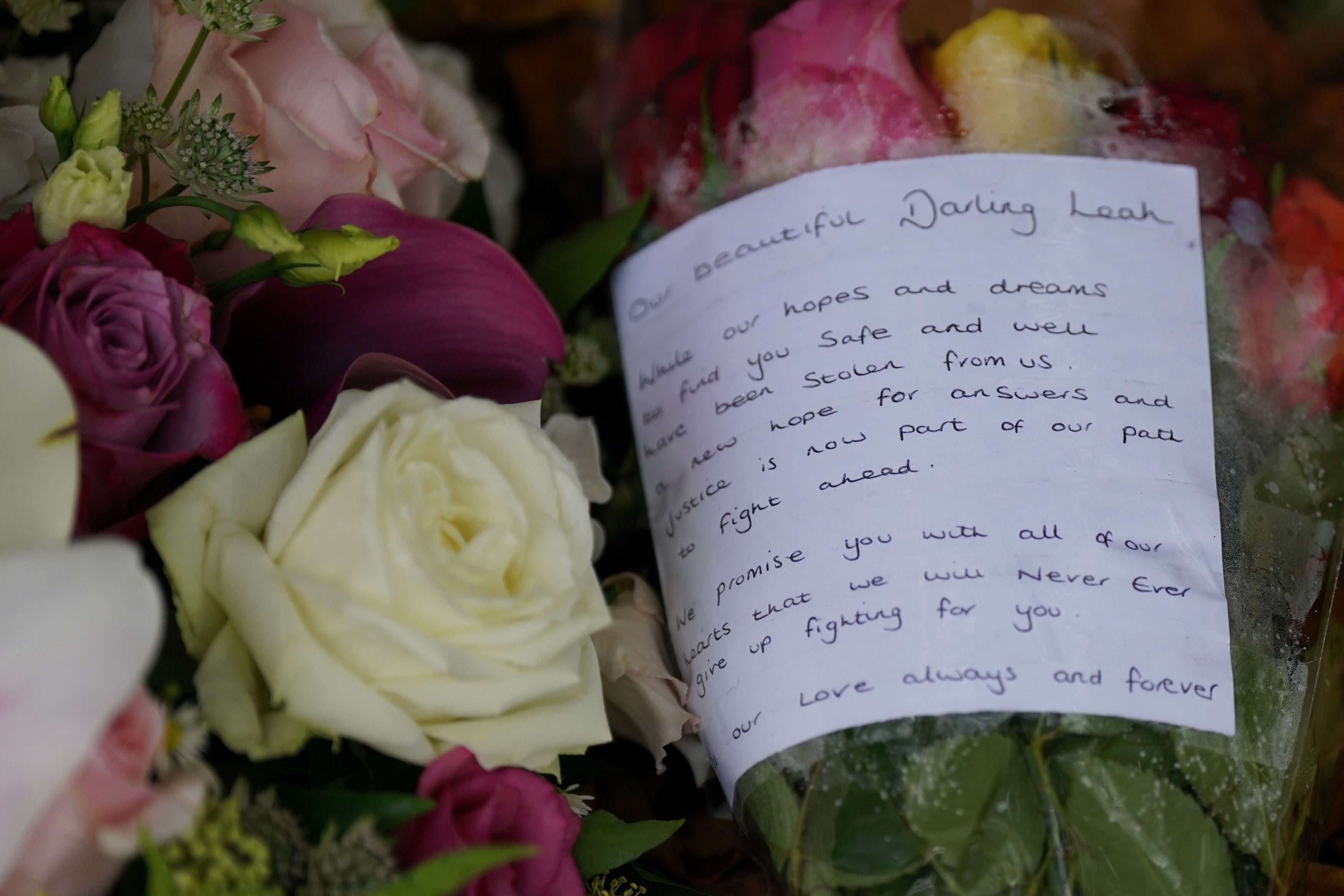 Flowers and a message left at the scene after police identified human remains