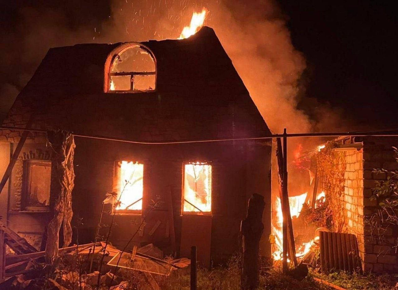 A bombed and burning house in the Tsvetmet district of Bakhmut, which is under constant barrage from Russian troops