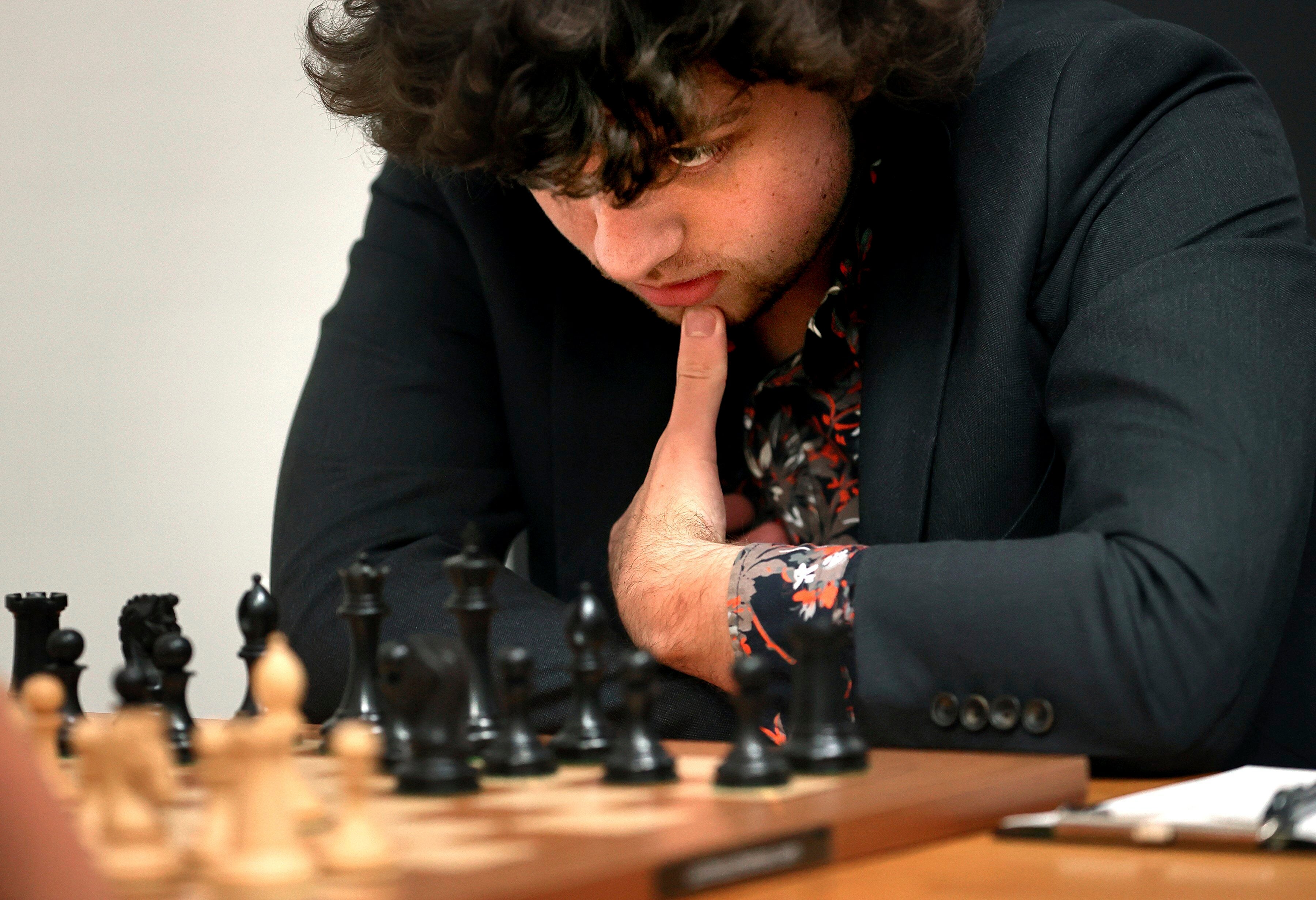 Grandmaster Hans Niemann, 19, studies the board during a match at the US Chess Championship in St Louis