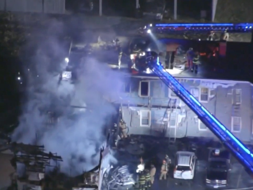 Smoke engulfs a New Hampshire apartment complex after a small plane crashed on 21 October