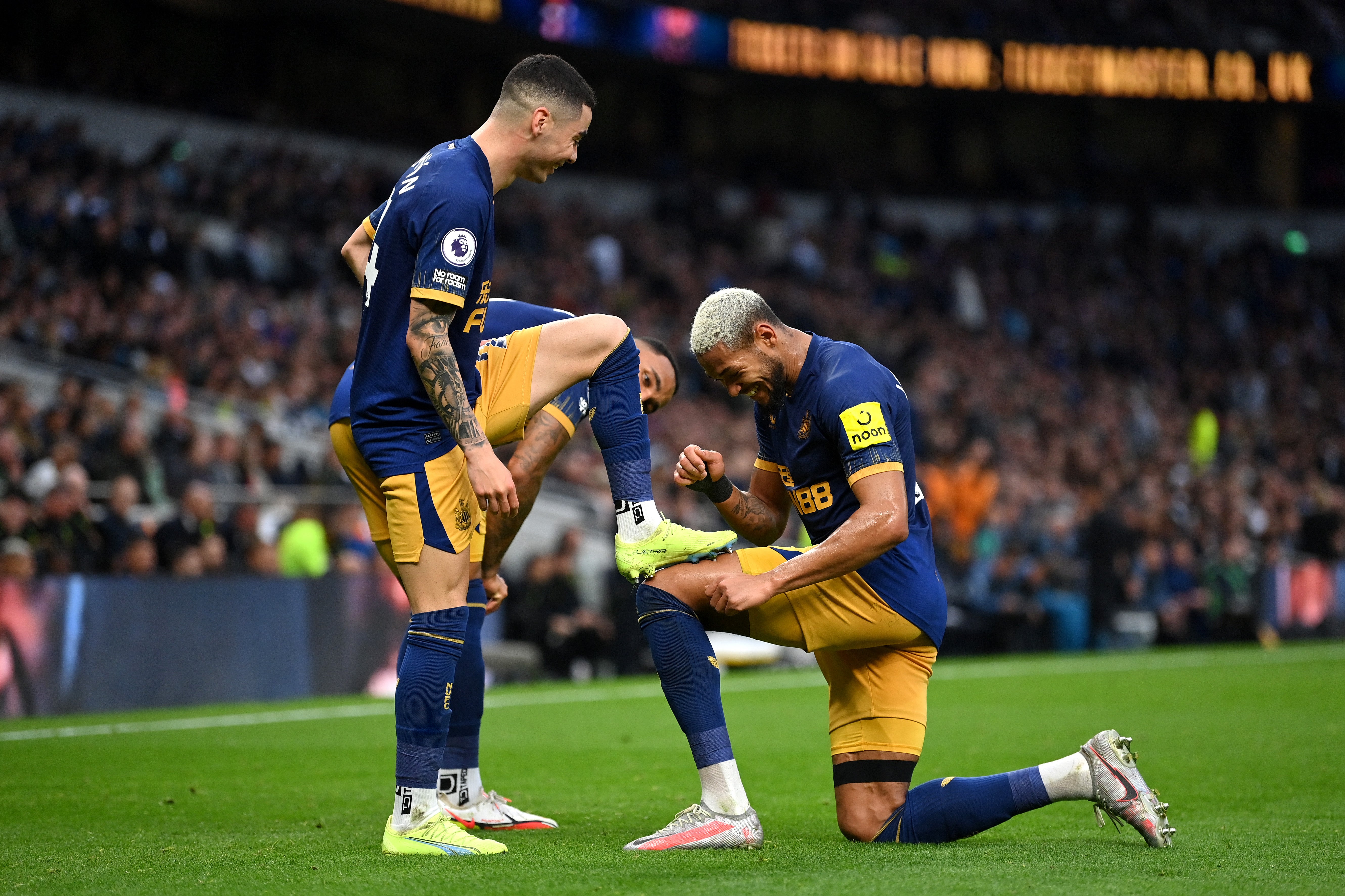 Polished finish: Miguel Almiron celebrates scoring Newcastle’s second goal with the help of Joelinton