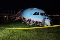 Korean Air flight overshoots runway, leaving plane nose crumpled on ground and forcing airport to close 