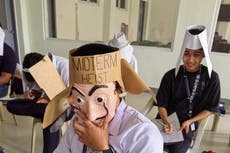 Students in Philippines wear creative ‘anti-cheating’ hats after professor gives them permission ‘to go wild’