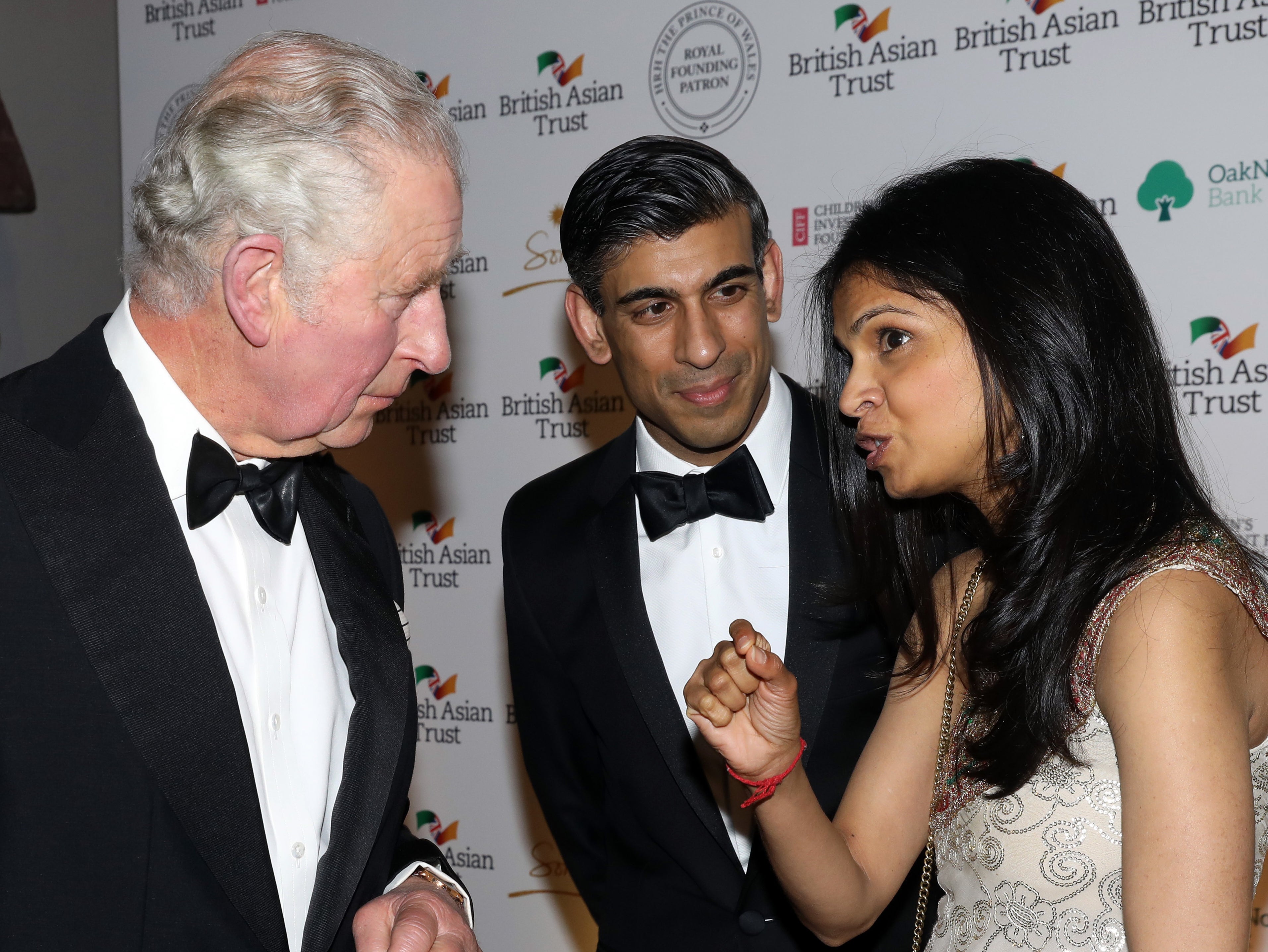 King Charles III, when he was the Prince of Wales, with Rishi Sunak and his wife Akshata Murthy at a British Asian Trust reception in February