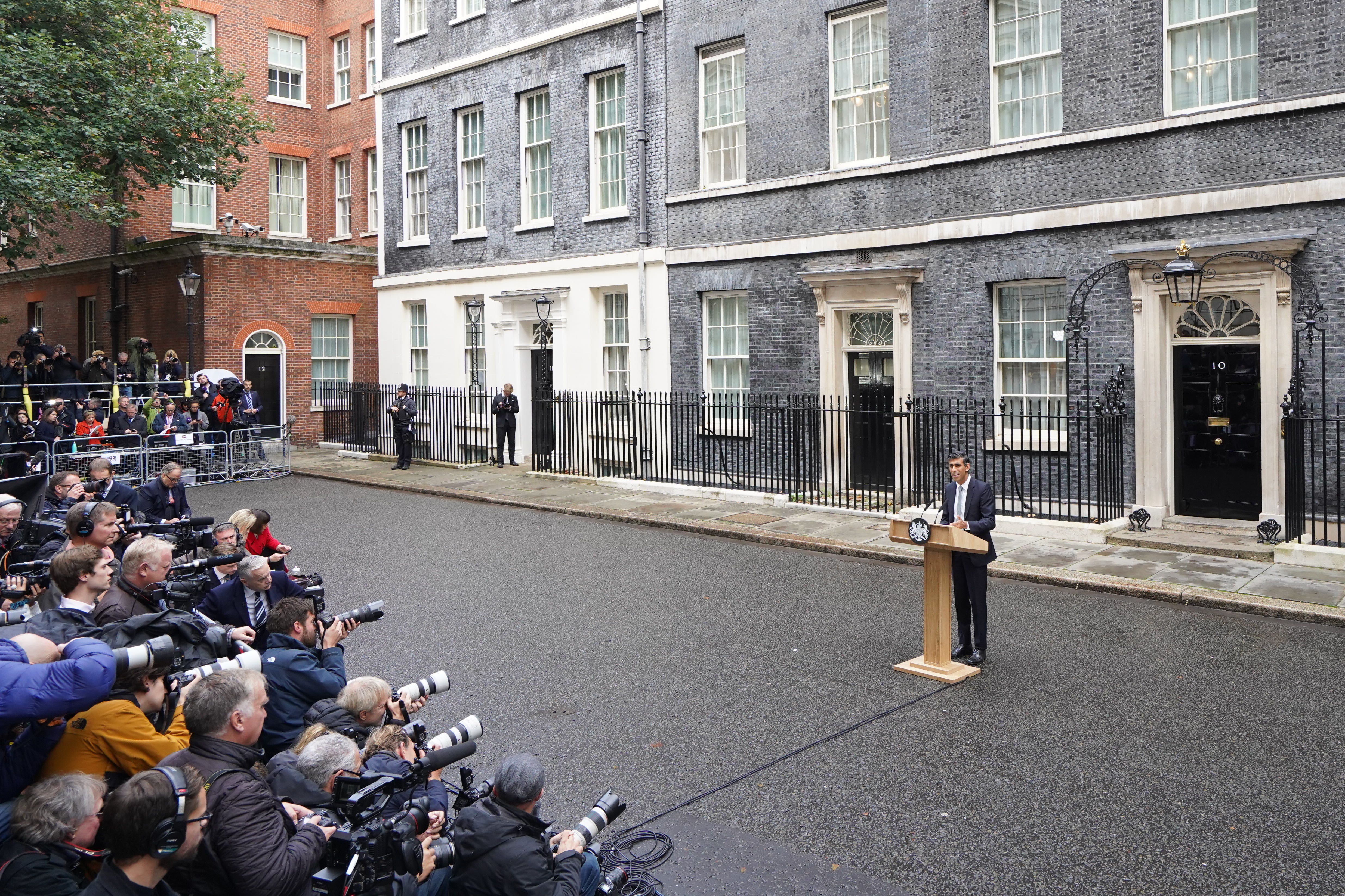 Rishi Sunak makes his first speech as Prime Minister outside 10 Downing Street in London (Gareth Fuller/PA)