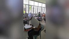 Students in Philippines wear bizarre ‘anti-cheating’ hats to block peripheral vision