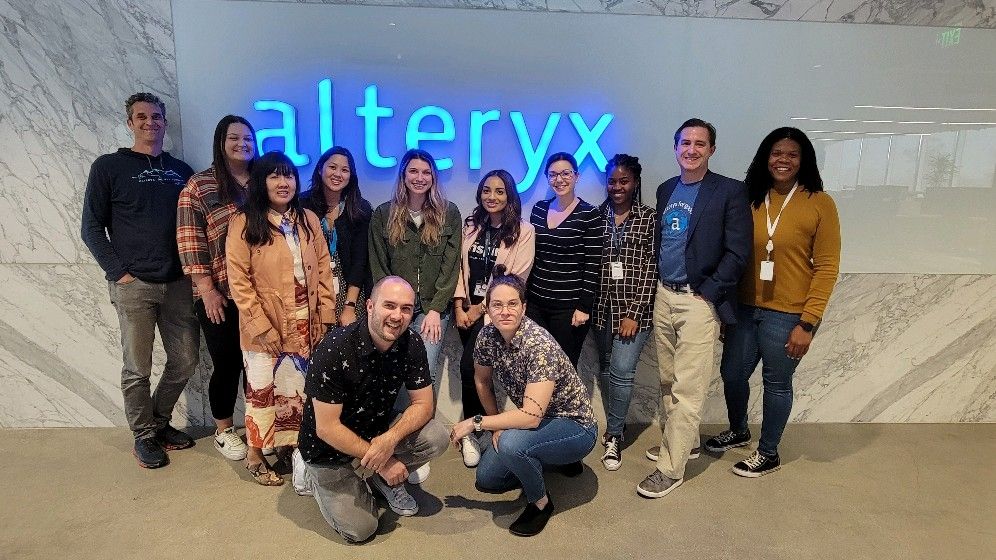 Star student: astrophysics major Razzia (centre, pink top) with her Alteryx colleagues