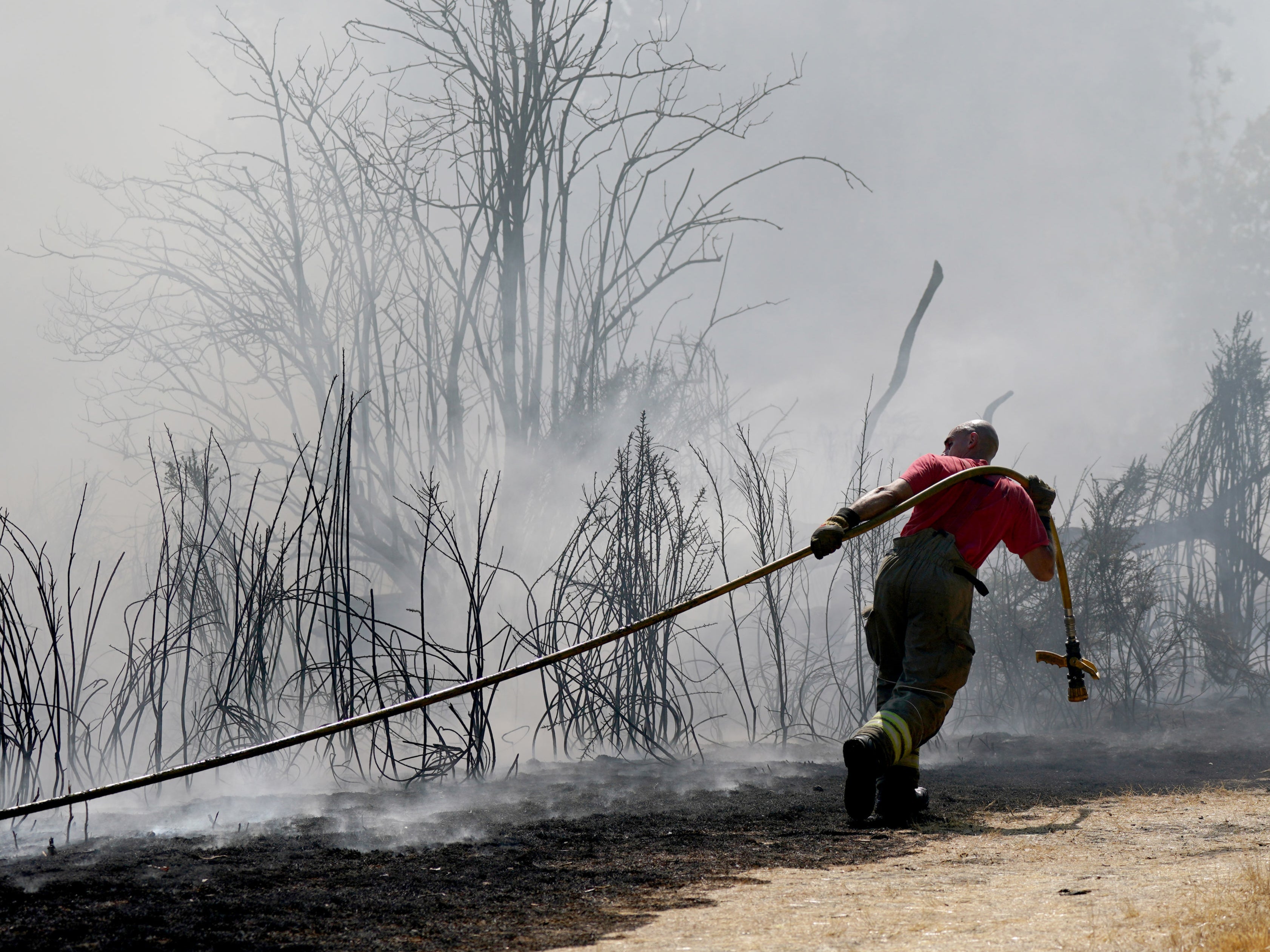 A grass fire on Leyton Flats, east London on August 12, 2022, as England experienced its driest summer in 50 years