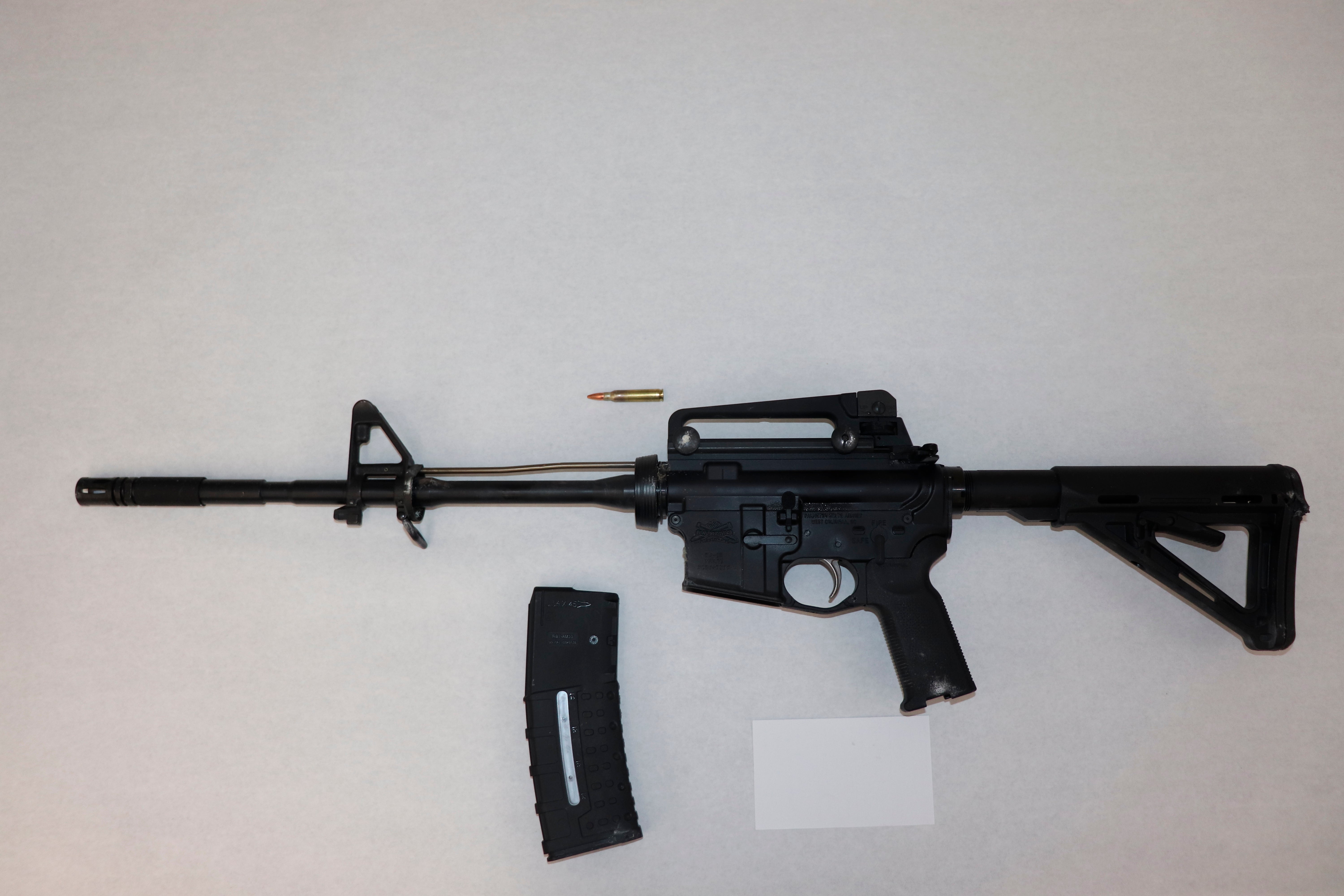 This image provided by the St. Louis Metropolitan Police Department shows an AR-15-style rifle used by a 19-year-old gunman who killed a teacher and a 15-year-old girl at a St. Louis high school on Monday, Oct. 24, 2022