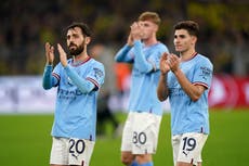 Pep Guardiola satisfied as tired Man City wrap up top spot with draw in Dortmund