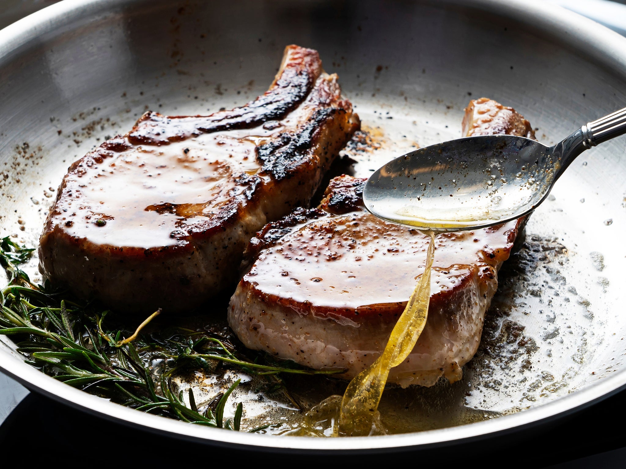 Use a large spoon to baste the chops with the butter, until the meat has an internal temperature of about 57C