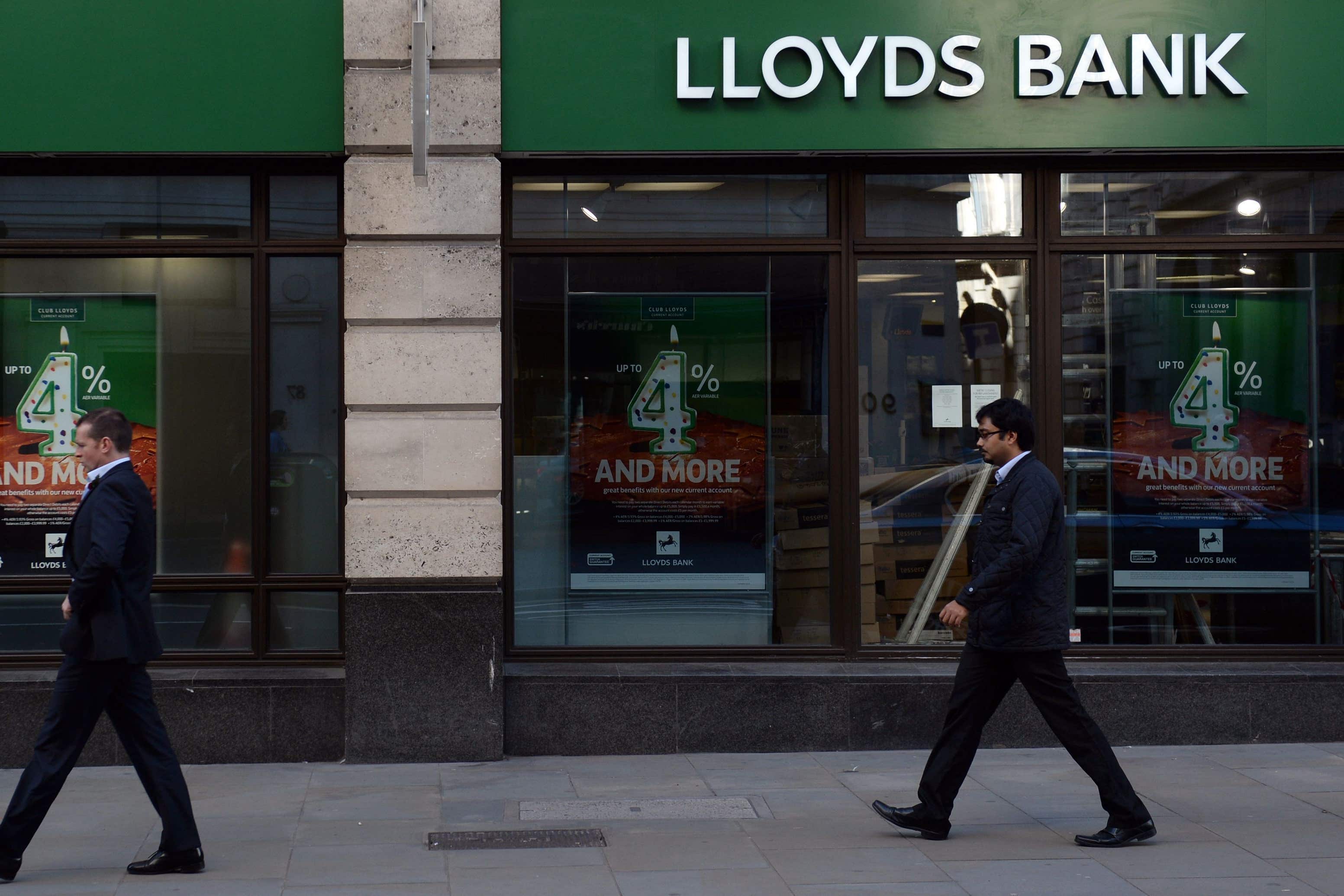 Lloyds Banking Group has reported a decline in its profits after revealing a hefty £668 million impairment charge as it gears up for heavier loan losses amid soaring mortgage rates (Stefan Rousseau/PA)