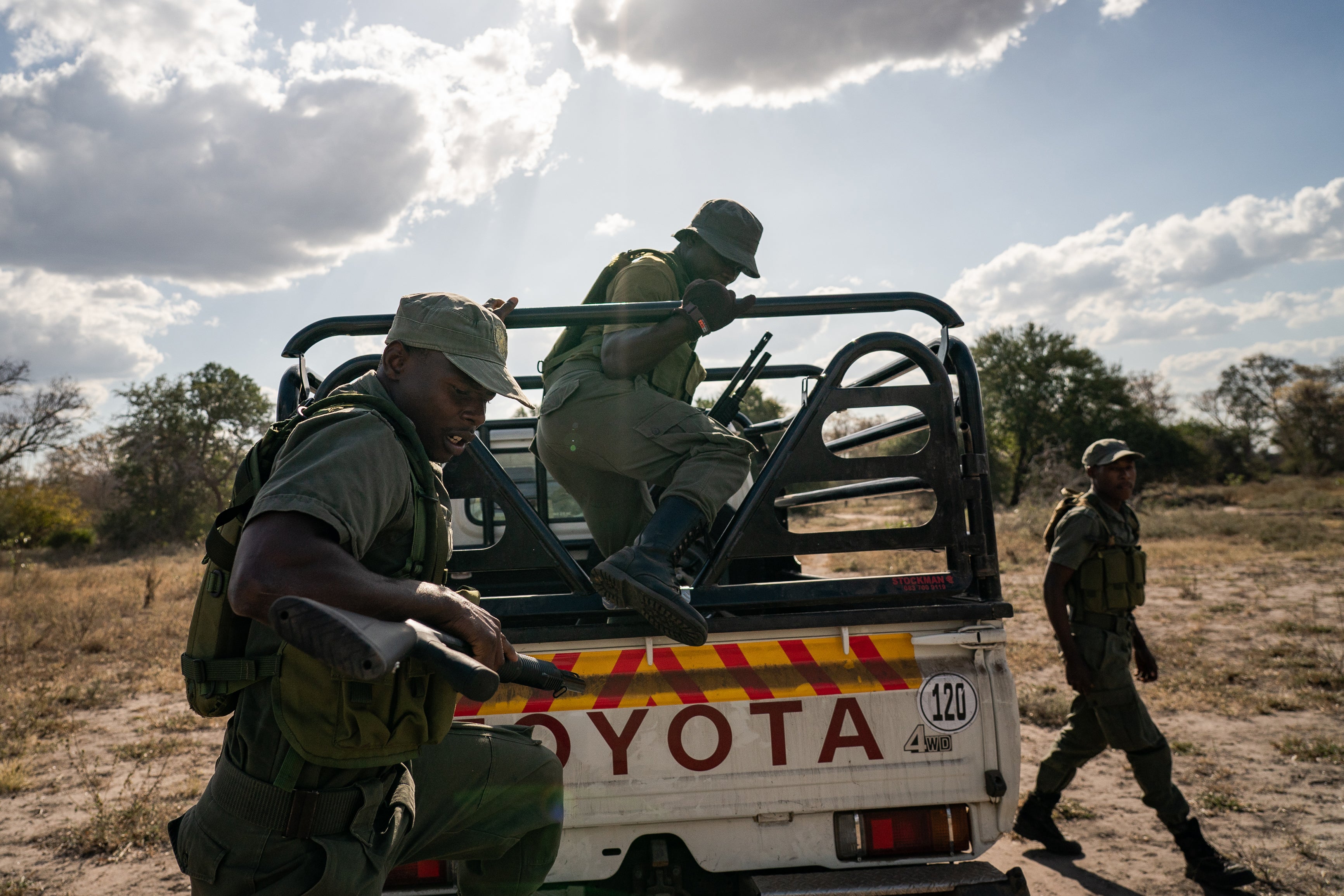 An anti-poaching unit armed with AK-47 semiautomatic weapons