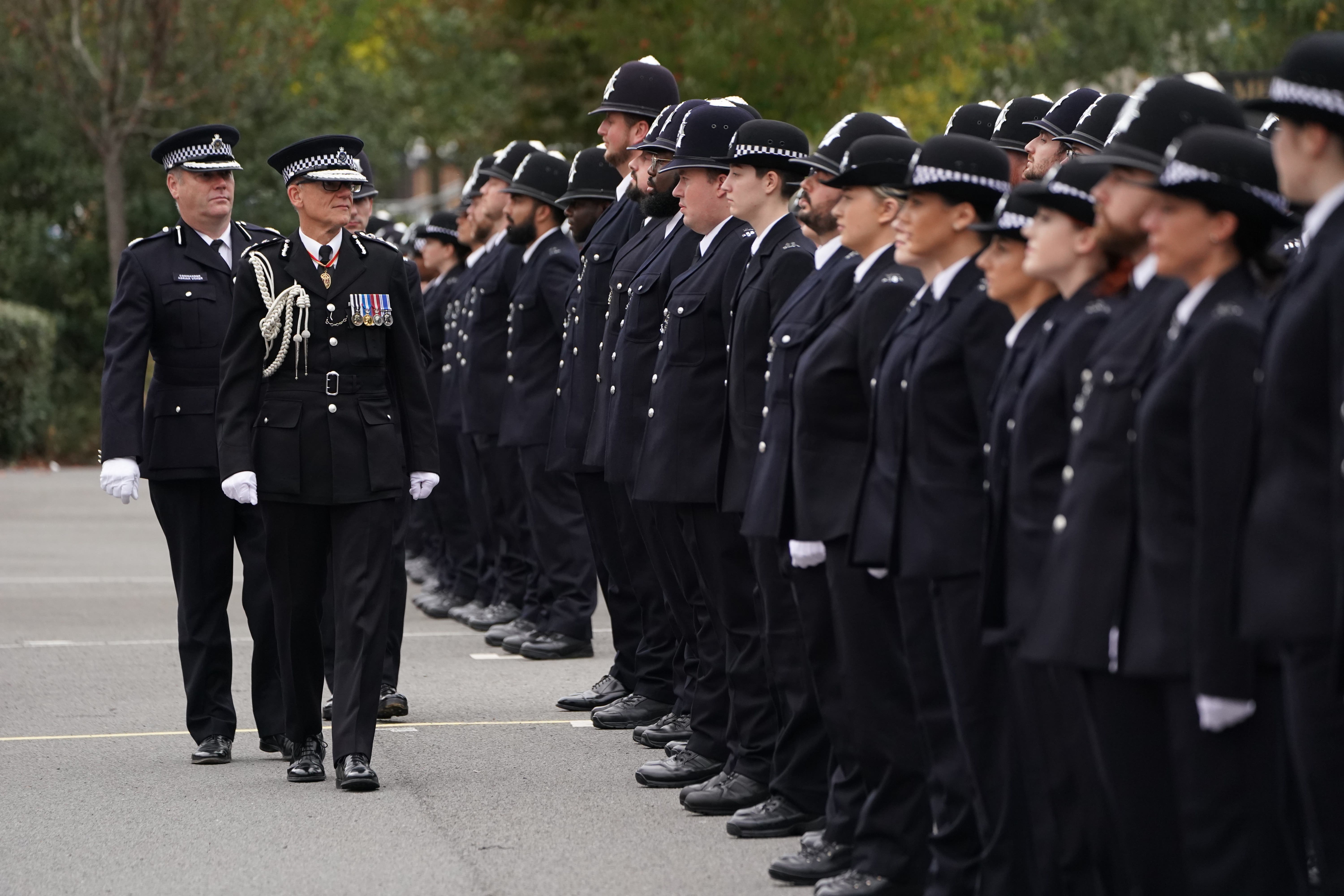 Metropolitan Police Commissioner Mark Rowley inspects new police recruits