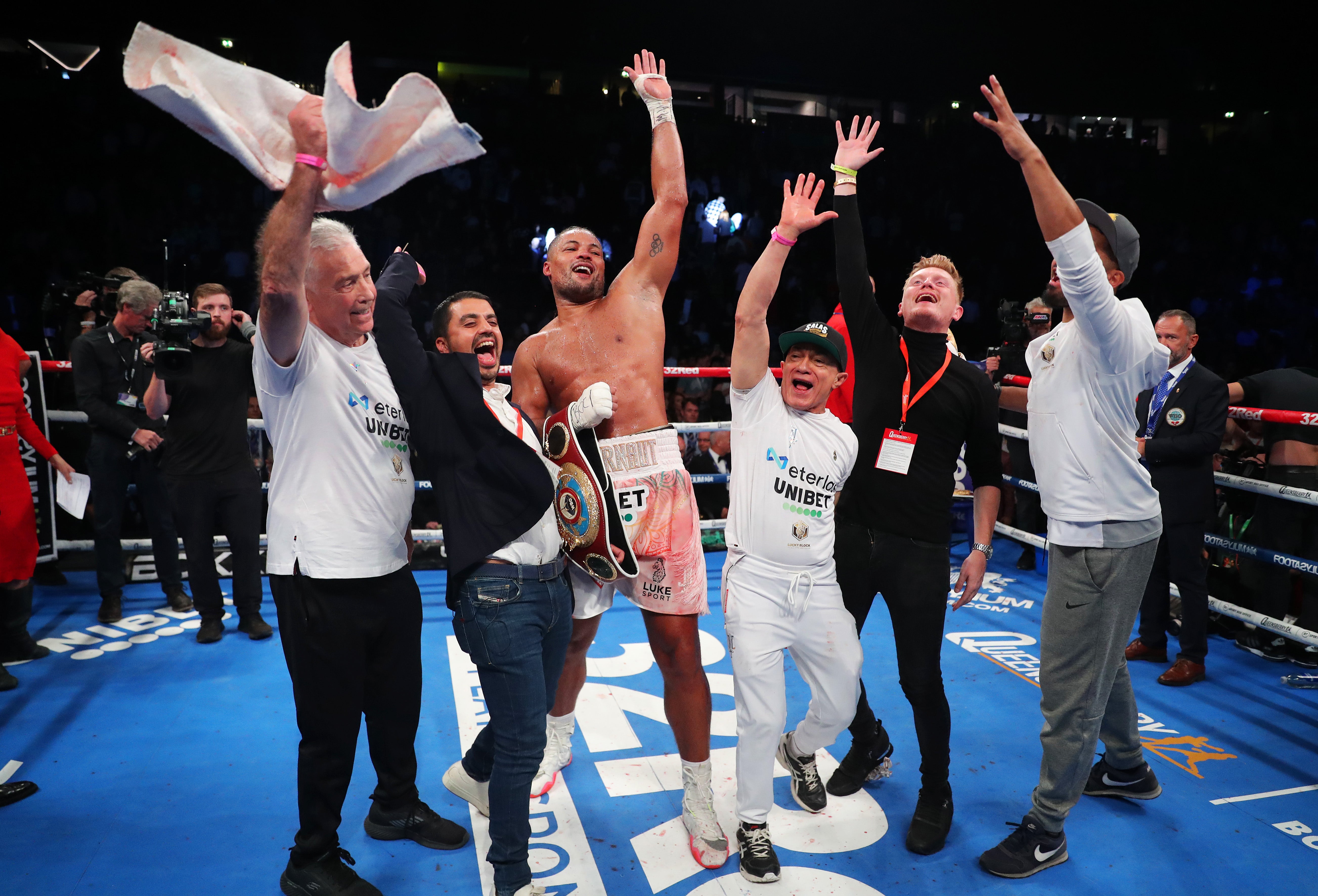 Joyce celebrates with his team after stopping Parker