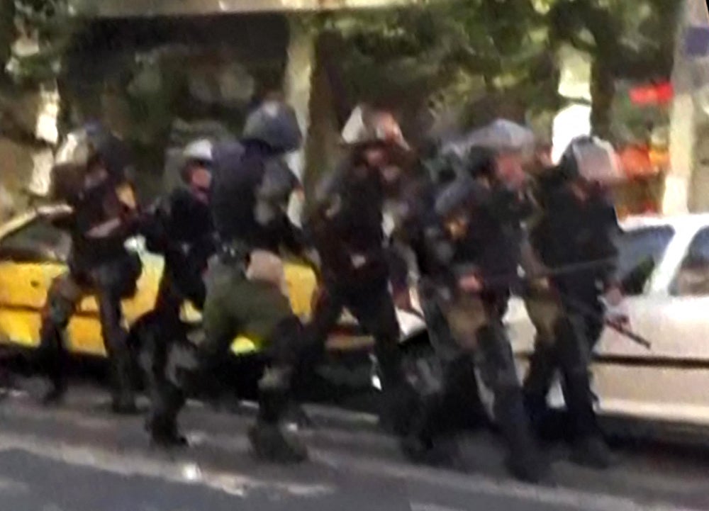 Riot police ready to confront protesters in Tehran, in video footage shared on social media