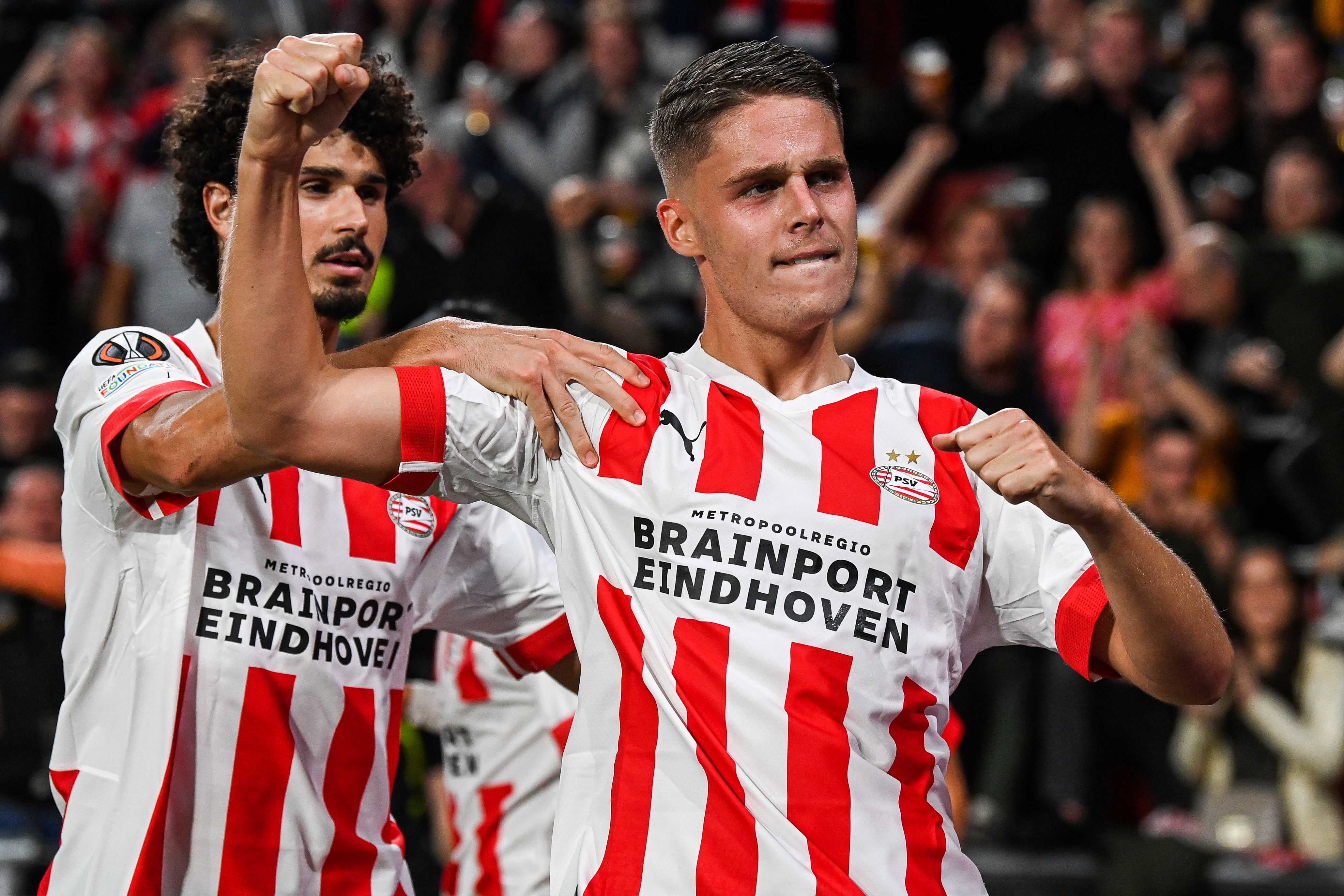 Andre Ramalho and Joey Veerman of PSV Eindhoven celebrate