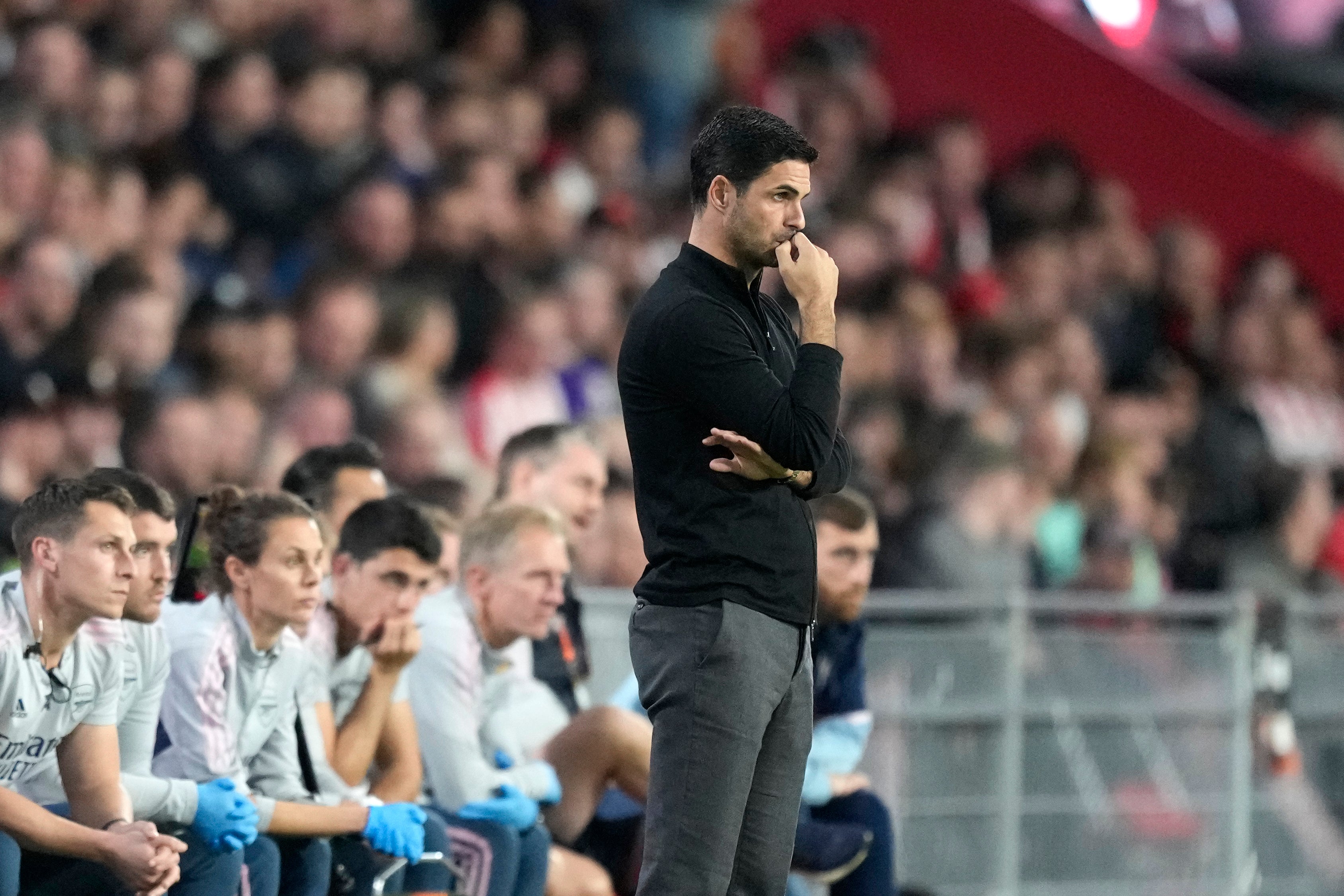 Mikel Arteta watches on as his Arsenal side struggle in Eindhoven