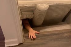 Fire brigade called to rescue mum stuck behind sofa